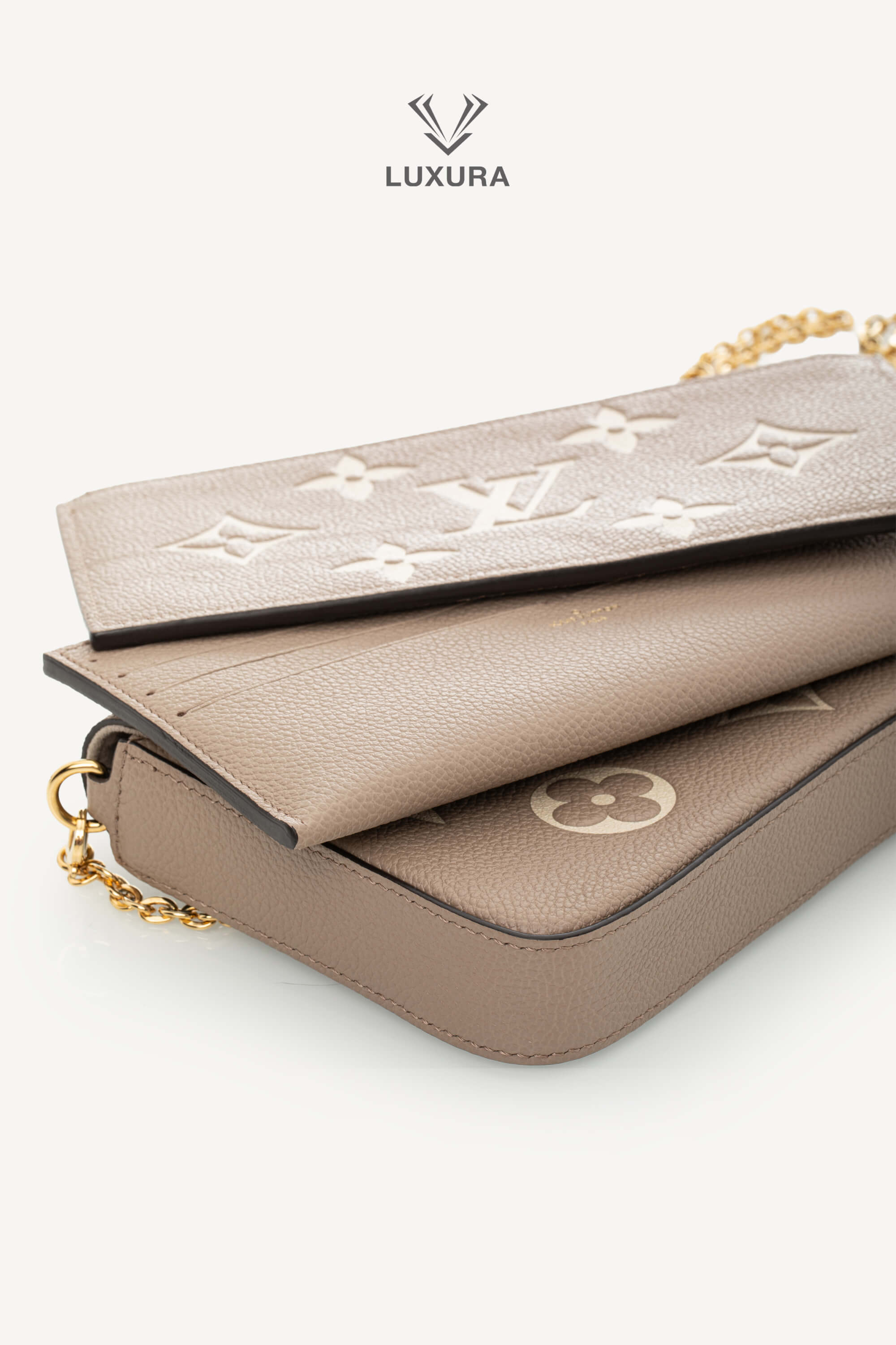 Genti de designeri pre-owned | IN TRENDING LOUIS VUITTON Felicie Pochete Monogram Empreinte Leather Dove Cream M82610