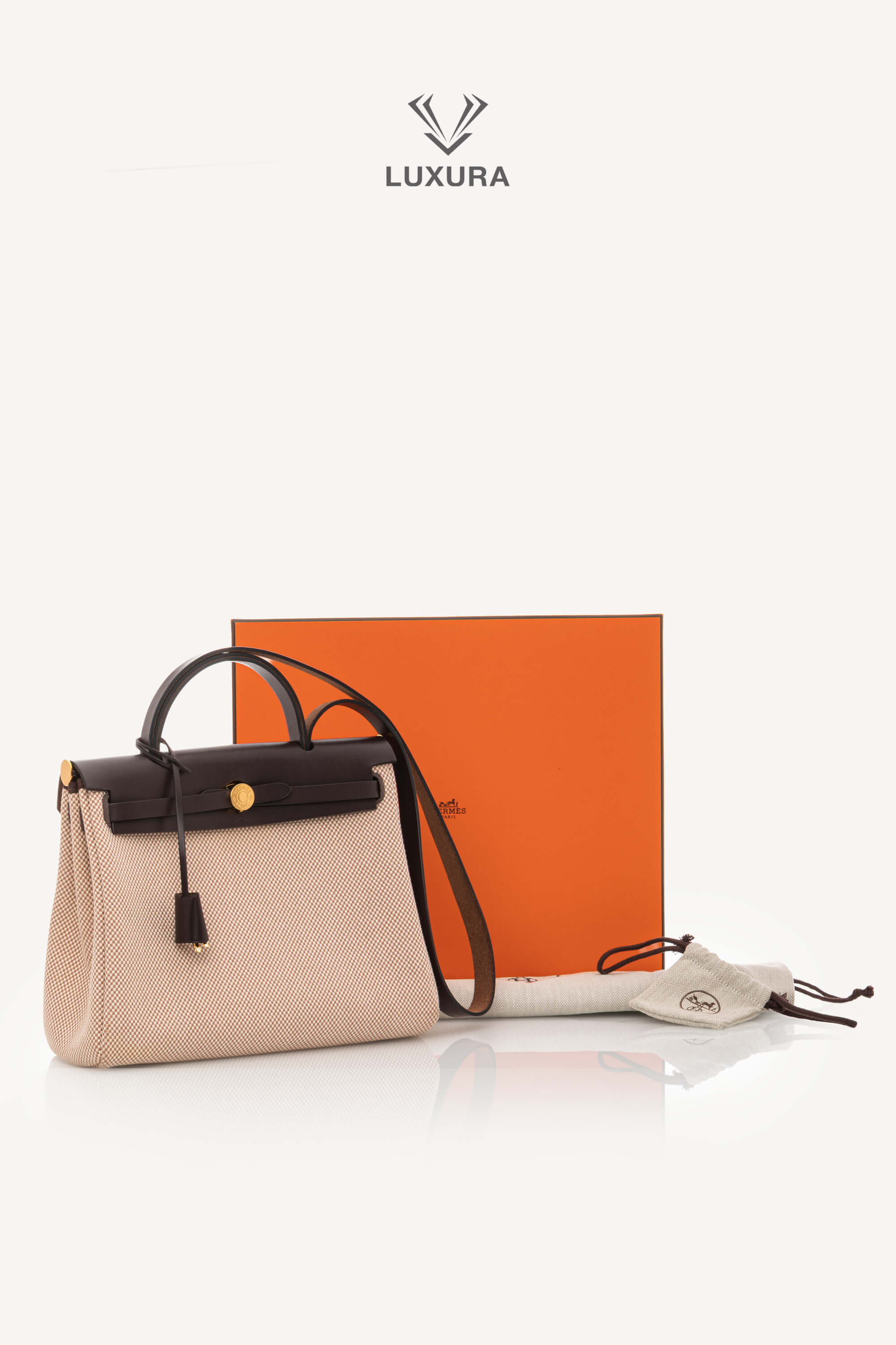 <span style="font-size: 10px;letter-spacing: .15em">BEST DEAL</span><br> <strong>HERMES</strong><br> <div style="margin-top:10px;font-size:16px">Hunter Criss Viking Herbag Zip Retourne 31 PM Rouge Sellier</div><br> - Image 2