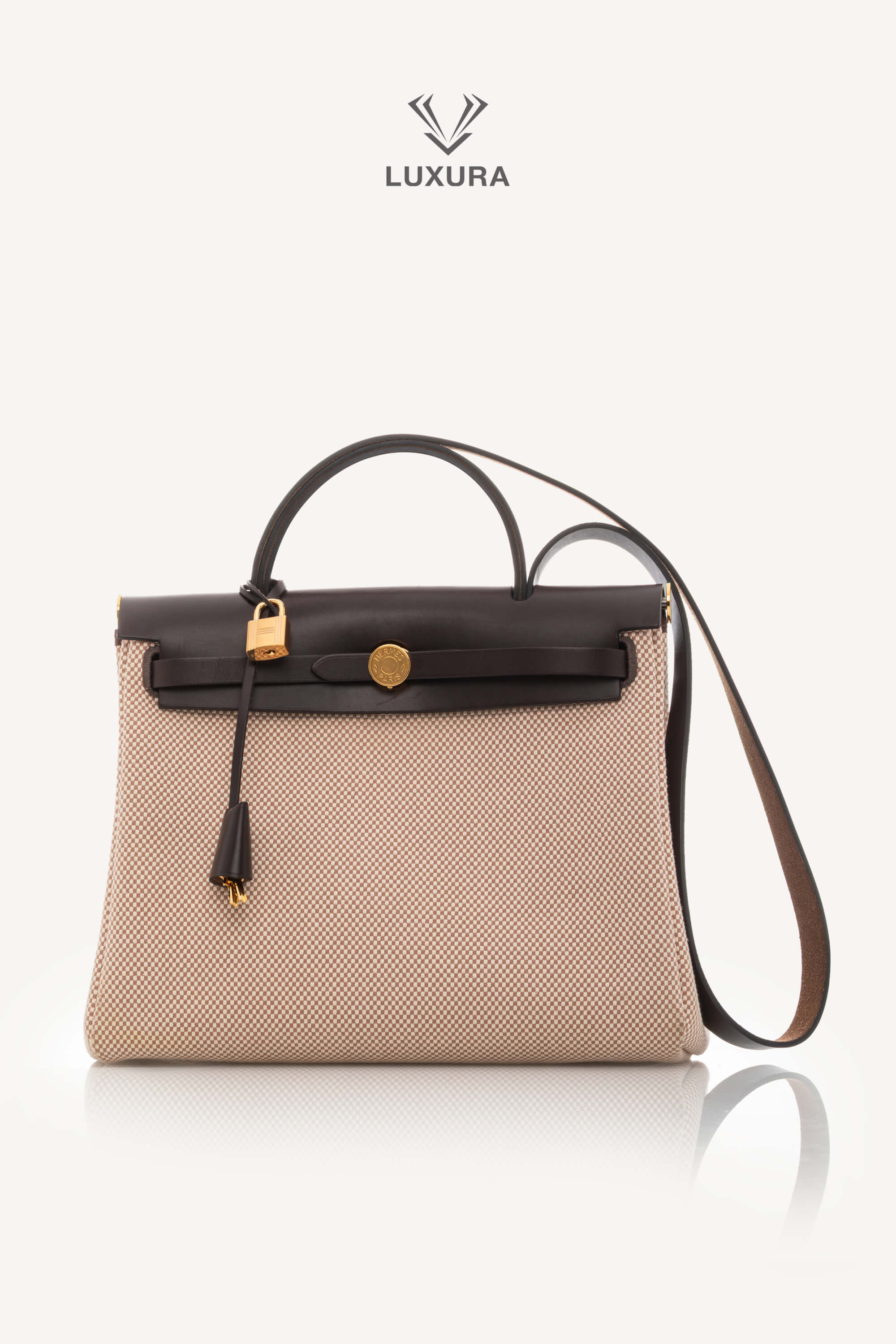 <span style="font-size: 10px;letter-spacing: .15em">BEST DEAL</span><br> <strong>HERMES</strong><br> <div style="margin-top:10px;font-size:16px">Hunter Criss Viking Herbag Zip Retourne 31 PM Rouge Sellier</div><br>