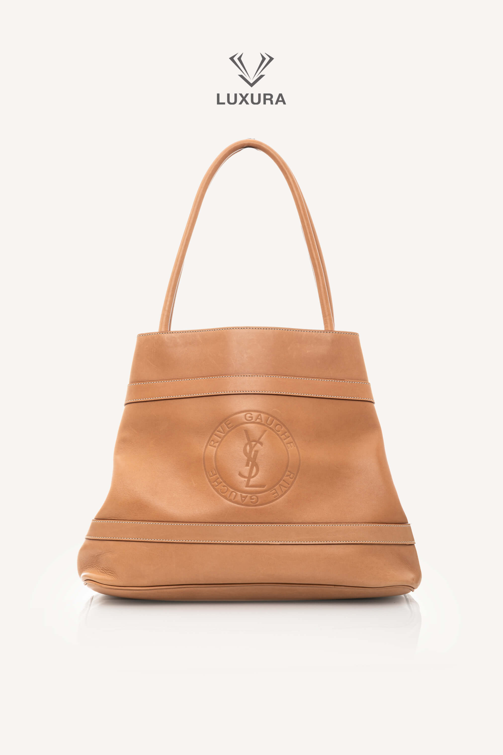 <span style="font-size: 10px;letter-spacing: .15em">BEST DEAL</span><br> <strong>SAINT LAURENT</strong><br> <div style="margin-top:10px;font-size:16px">Rive Gauche Large Tote Bag Beige</div><br>