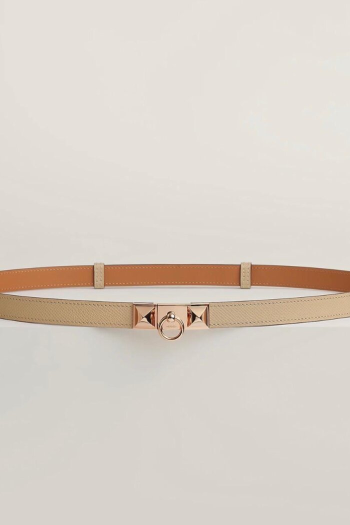 <span style="font-size: 10px;letter-spacing: .15em">HARD TO FIND</span><br>            <strong>HERMES</strong><br>            <div style="margin-top:10px;font-size:16px">Rivale Belt Trench with Rose Gold Finish Gold Adjustable size from 55 cm to 100 cm</div><br>