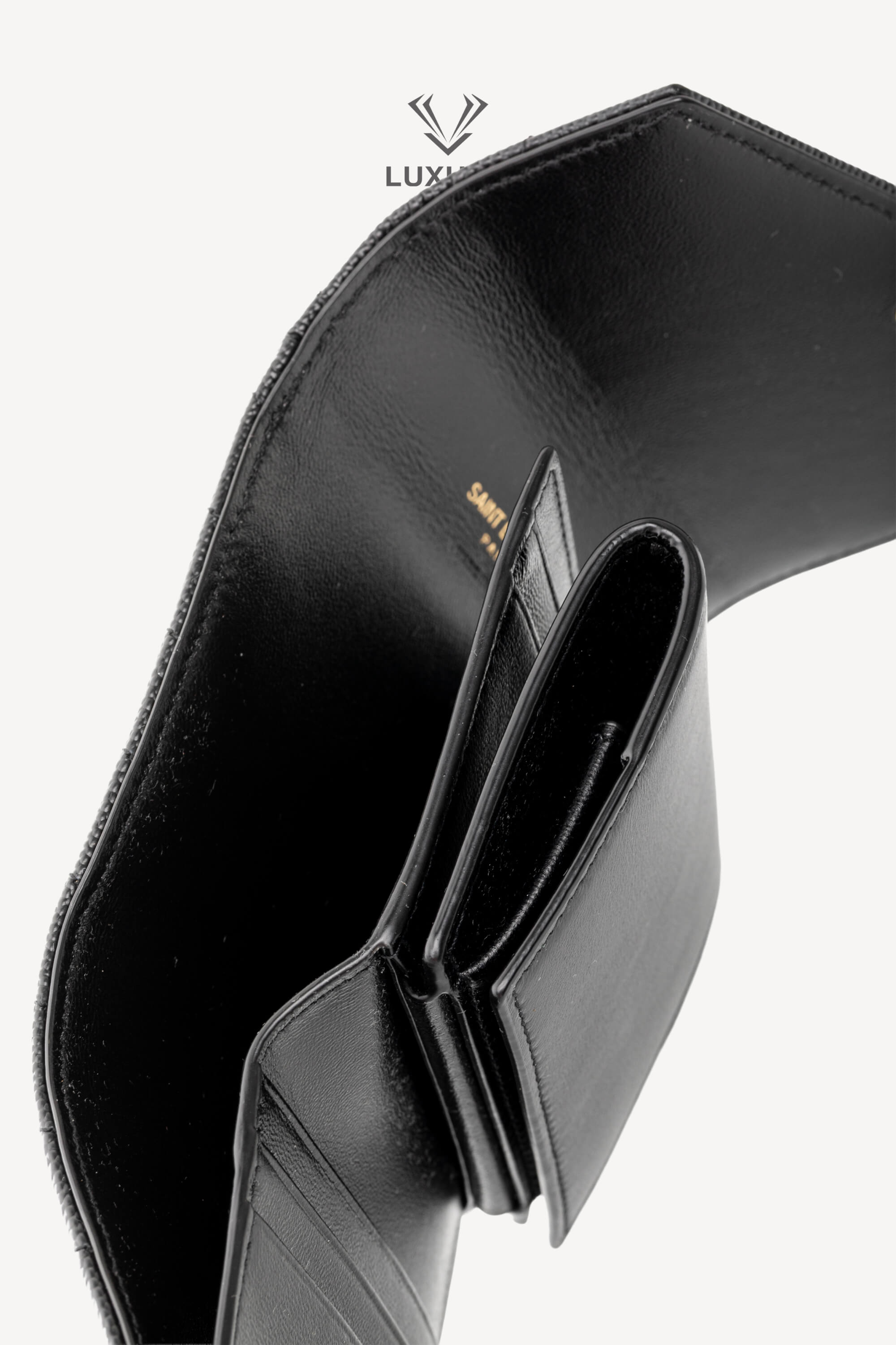 <span style="font-size: 10px;letter-spacing: .15em">BEST DEAL</span><br>            <strong>SAINT LAURENT</strong><br>            <div style="margin-top:10px;font-size:16px">Cassandre Matelasse Multi-Folder Wallet in Grain de Poudre Black Leather</div><br> - Image 7