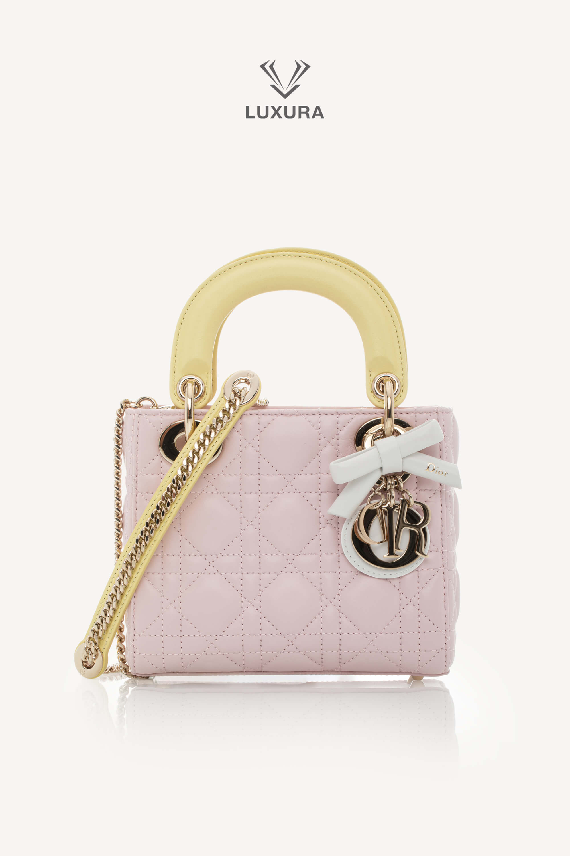 <span style="font-size: 10px;letter-spacing: .15em">NEW COLLECTION</span><br> <strong>DIOR</strong><br> <div style="margin-top:10px;font-size:16px">Lady Dior Mini Bag with Chain Lambskin Leather with Cannage Patern in Soft Pink Mimosa and White</div><br> - Image 7