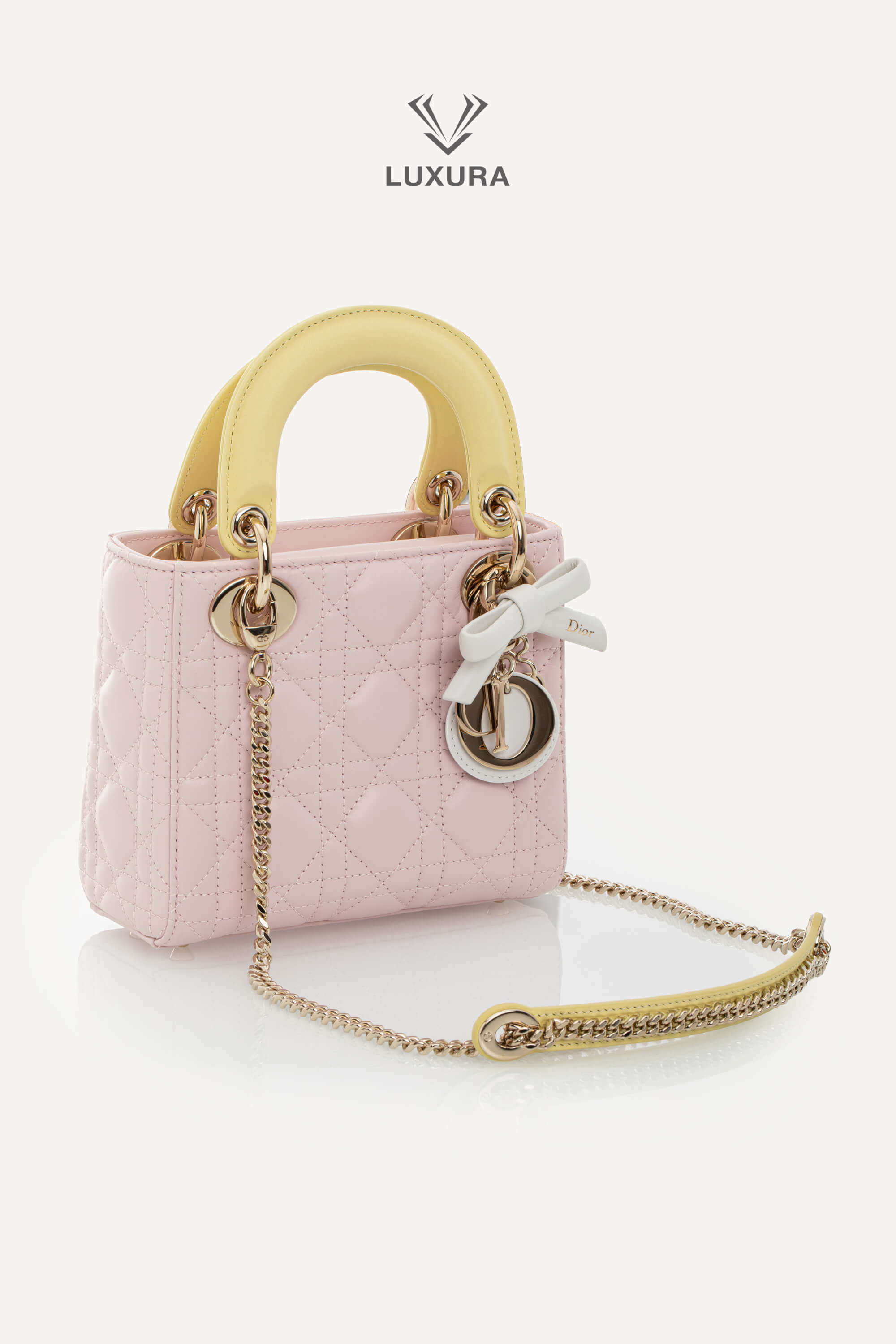 <span style="font-size: 10px;letter-spacing: .15em">NEW COLLECTION</span><br> <strong>DIOR</strong><br> <div style="margin-top:10px;font-size:16px">Lady Dior Mini Bag with Chain Lambskin Leather with Cannage Patern in Soft Pink Mimosa and White</div><br> - Image 6