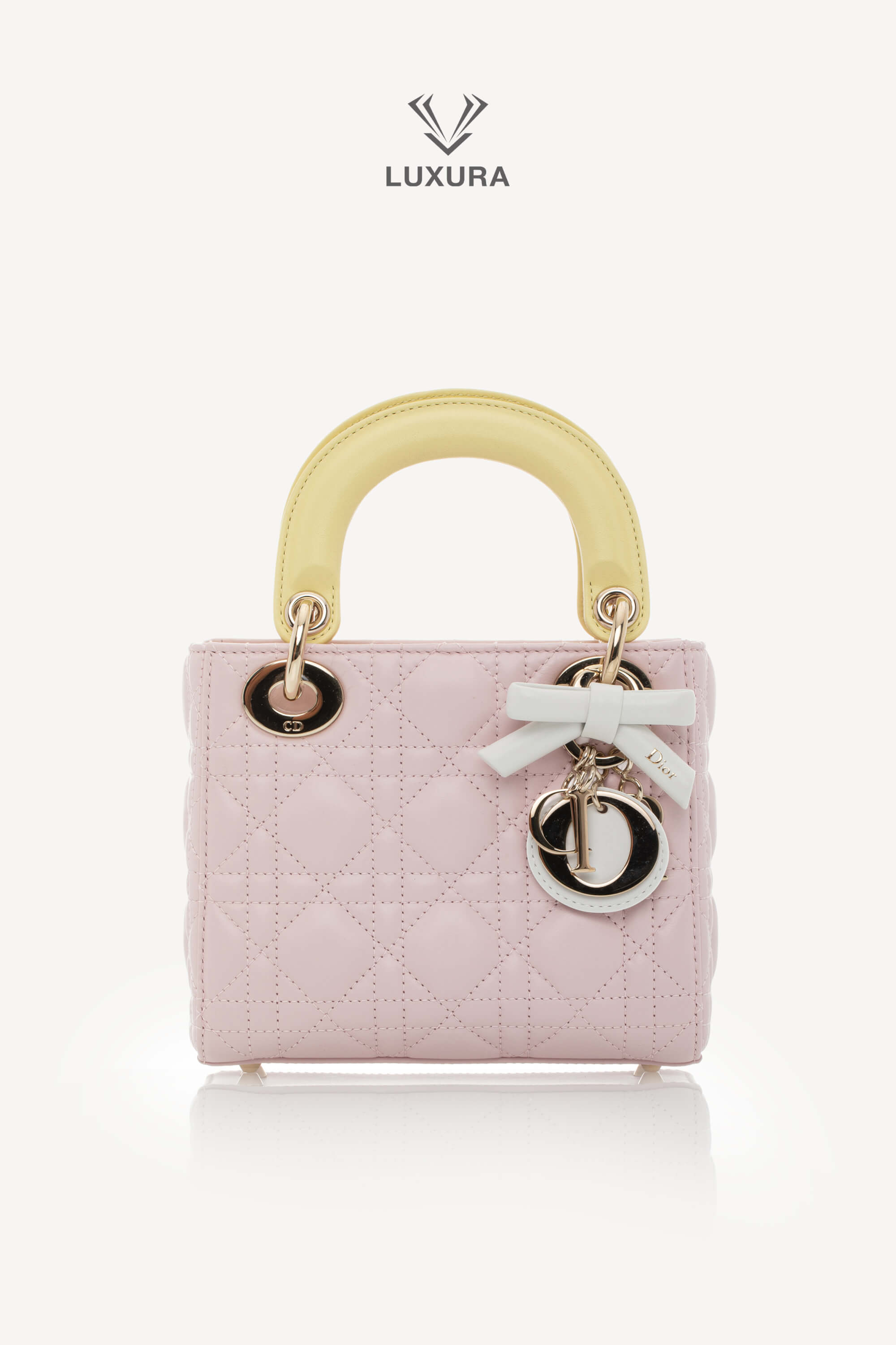 <span style="font-size: 10px;letter-spacing: .15em">NEW COLLECTION</span><br> <strong>DIOR</strong><br> <div style="margin-top:10px;font-size:16px">Lady Dior Mini Bag with Chain Lambskin Leather with Cannage Patern in Soft Pink Mimosa and White</div><br> - Image 5