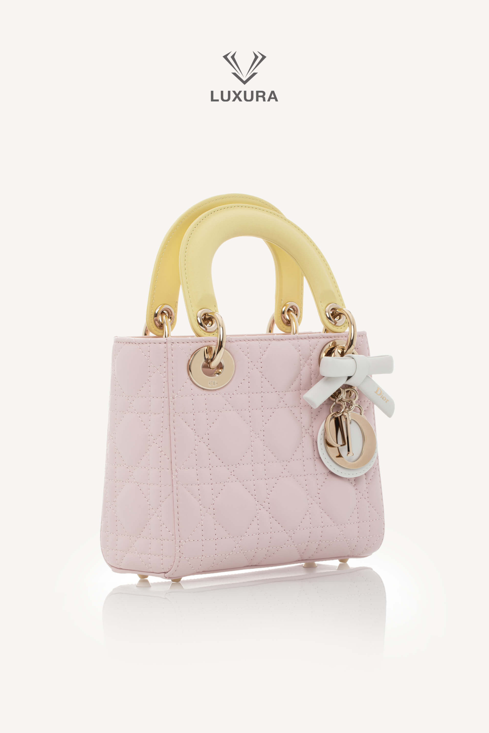 <span style="font-size: 10px;letter-spacing: .15em">NEW COLLECTION</span><br> <strong>DIOR</strong><br> <div style="margin-top:10px;font-size:16px">Lady Dior Mini Bag with Chain Lambskin Leather with Cannage Patern in Soft Pink Mimosa and White</div><br> - Image 4