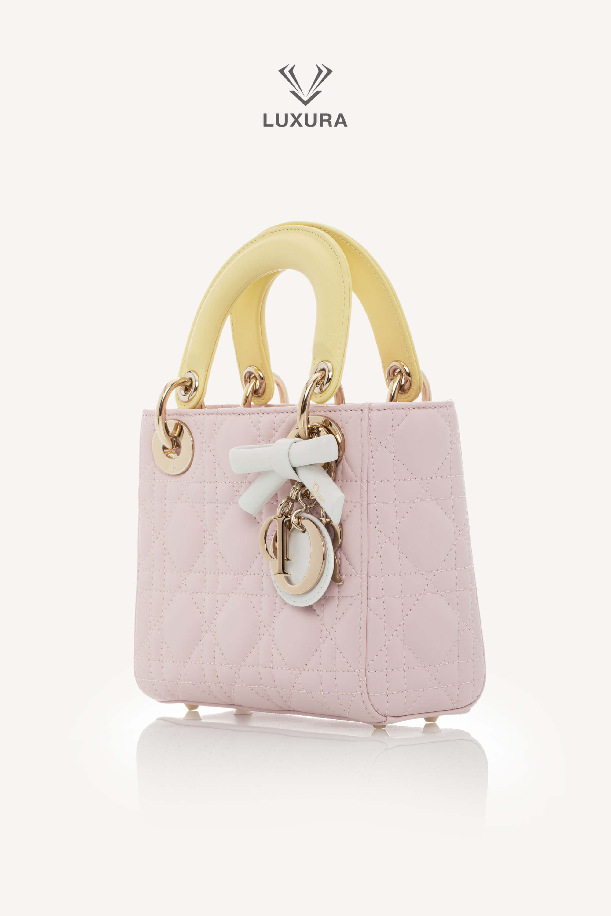 <span style="font-size: 10px;letter-spacing: .15em">NEW COLLECTION</span><br> <strong>DIOR</strong><br> <div style="margin-top:10px;font-size:16px">Lady Dior Mini Bag with Chain Lambskin Leather with Cannage Patern in Soft Pink Mimosa and White</div><br> - Image 11