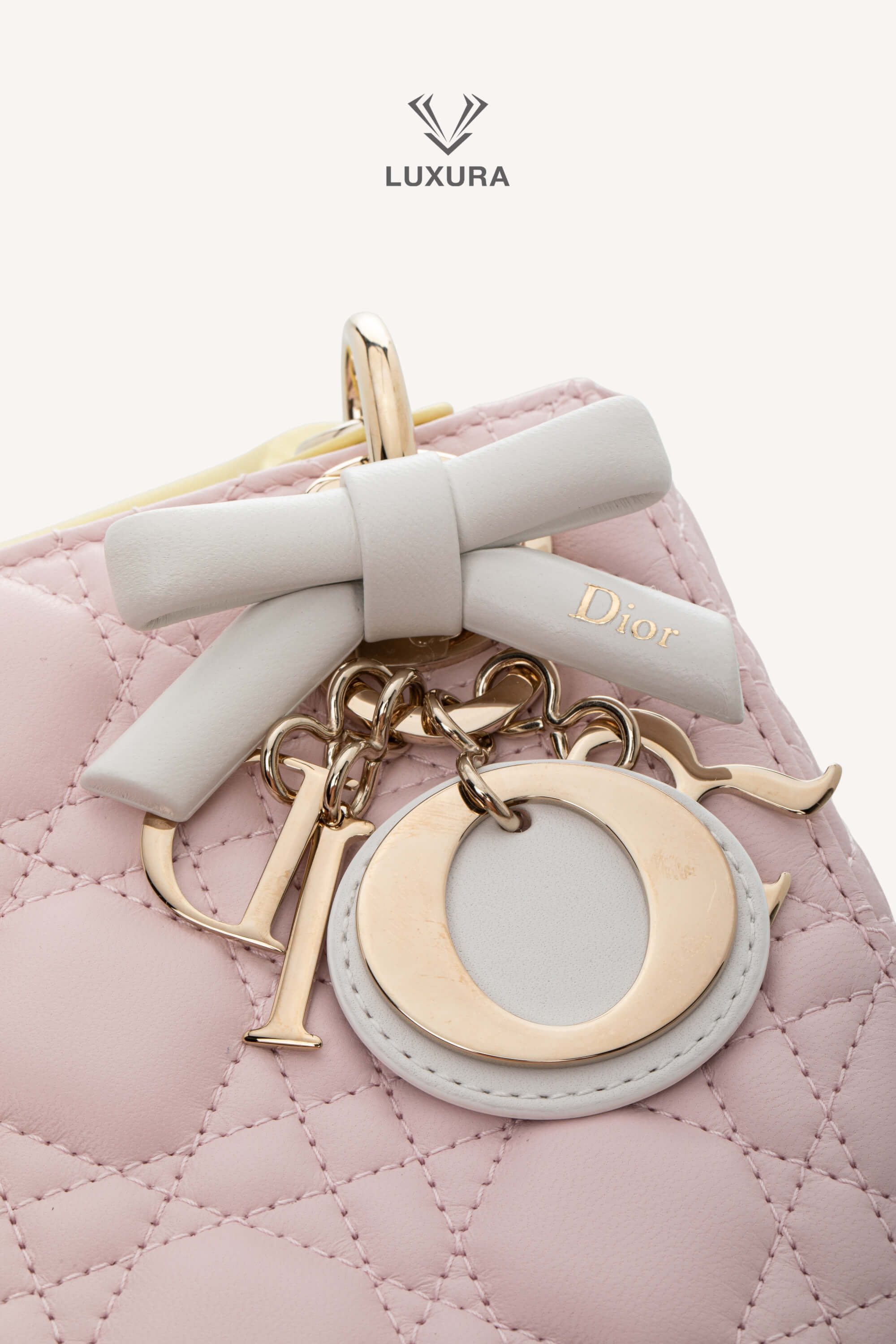 <span style="font-size: 10px;letter-spacing: .15em">NEW COLLECTION</span><br> <strong>DIOR</strong><br> <div style="margin-top:10px;font-size:16px">Lady Dior Mini Bag with Chain Lambskin Leather with Cannage Patern in Soft Pink Mimosa and White</div><br> - Image 12
