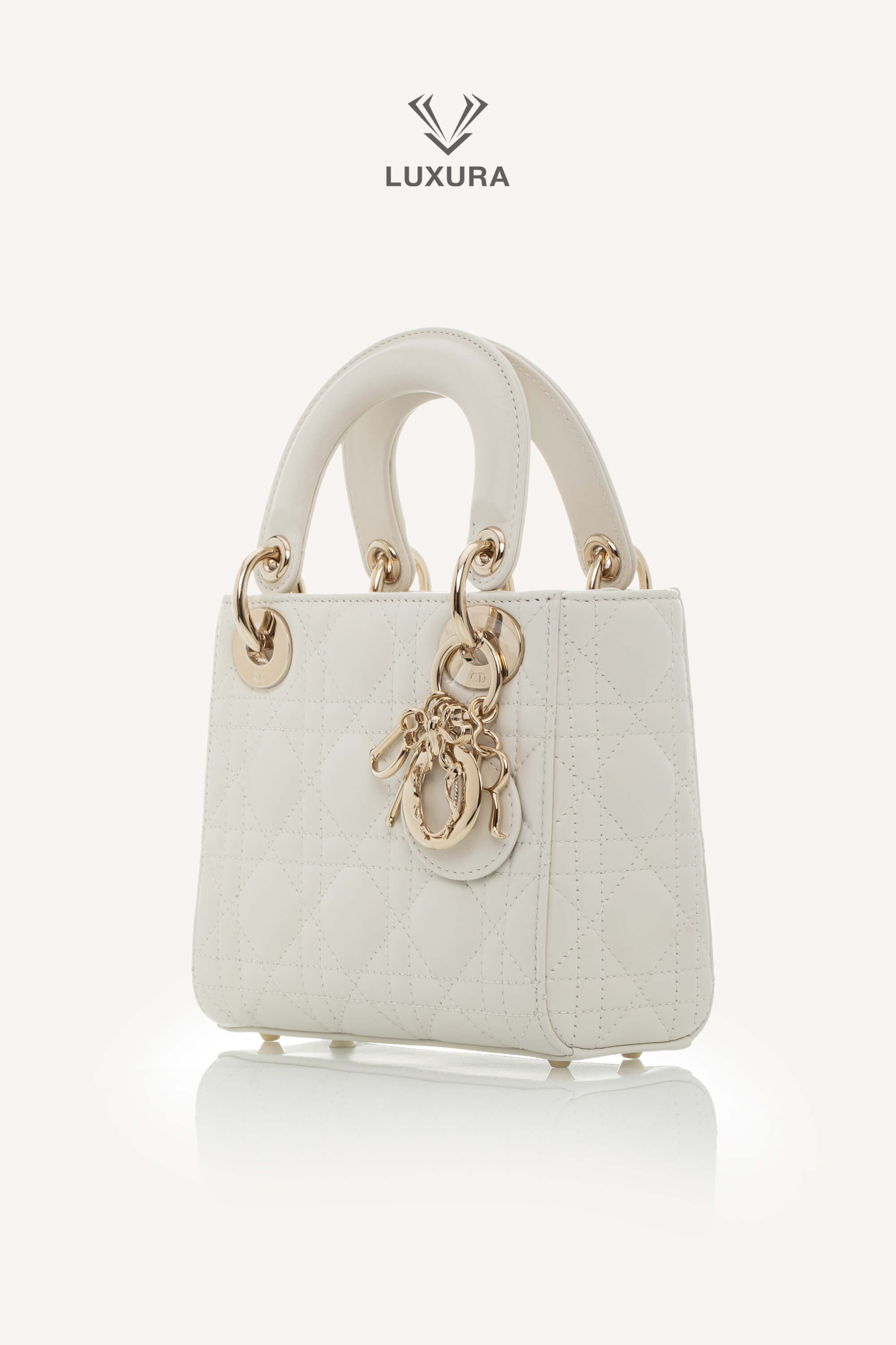 <span style="font-size: 10px;letter-spacing: .15em">NEW COLLECTION</span><br> <strong>DIOR</strong><br> <div style="margin-top:10px;font-size:16px">Mini Lady Dior Bag with Chain Latte Cannage Lambskin</div><br> - Image 9