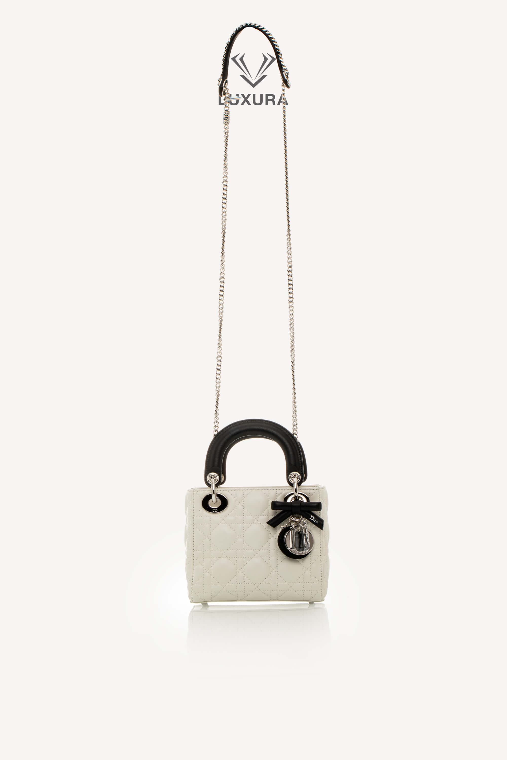 <span style="font-size: 10px;letter-spacing: .15em">NEW COLLECTION</span><br> <strong>DIOR</strong><br> <div style="margin-top:10px;font-size:16px">Mini Lady Dior Bag with Chain Two-Tone Latte and Black Cannage Lambskin</div><br> - Image 8
