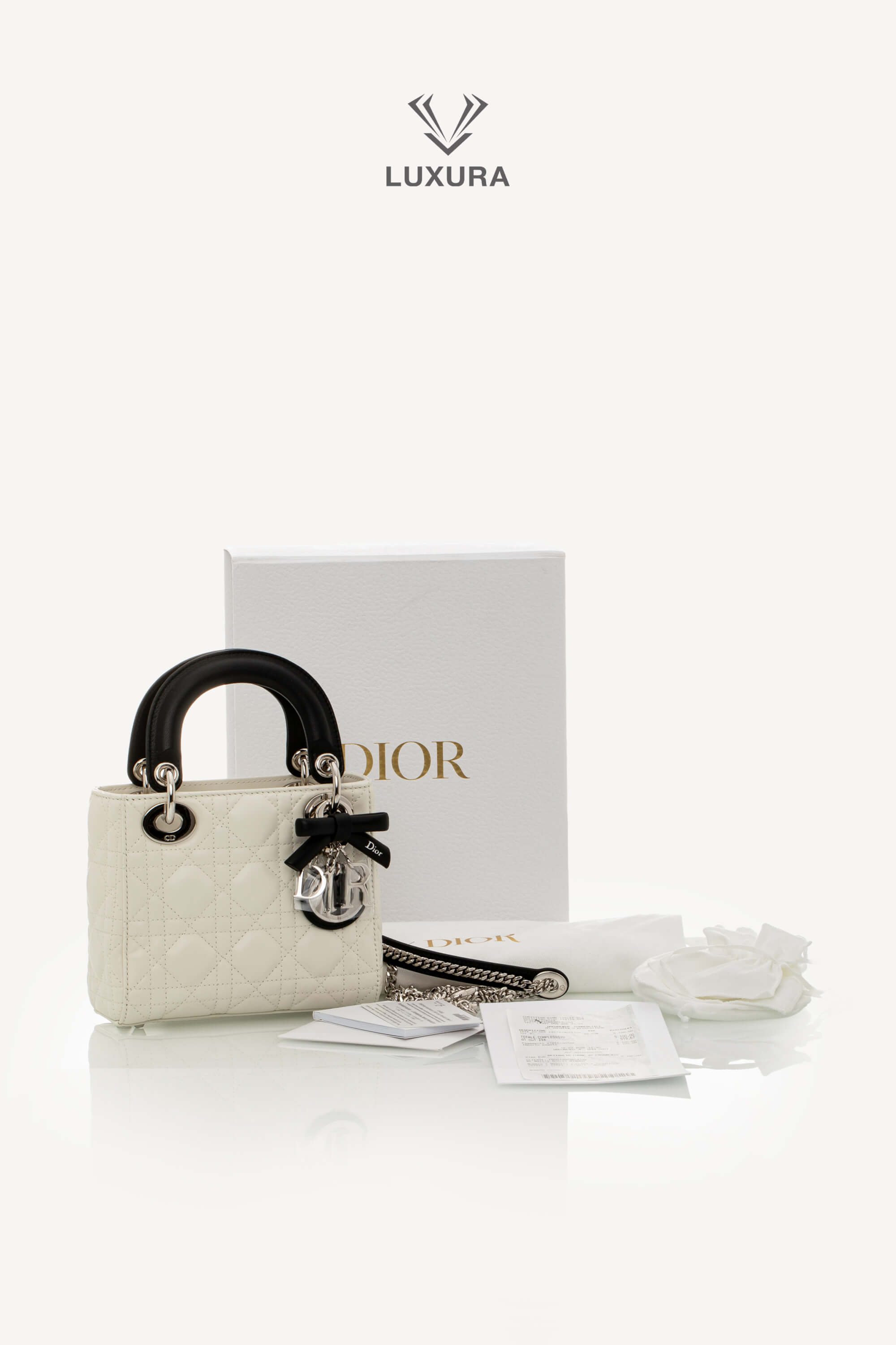 <span style="font-size: 10px;letter-spacing: .15em">NEW COLLECTION</span><br> <strong>DIOR</strong><br> <div style="margin-top:10px;font-size:16px">Mini Lady Dior Bag with Chain Two-Tone Latte and Black Cannage Lambskin</div><br> - Image 2