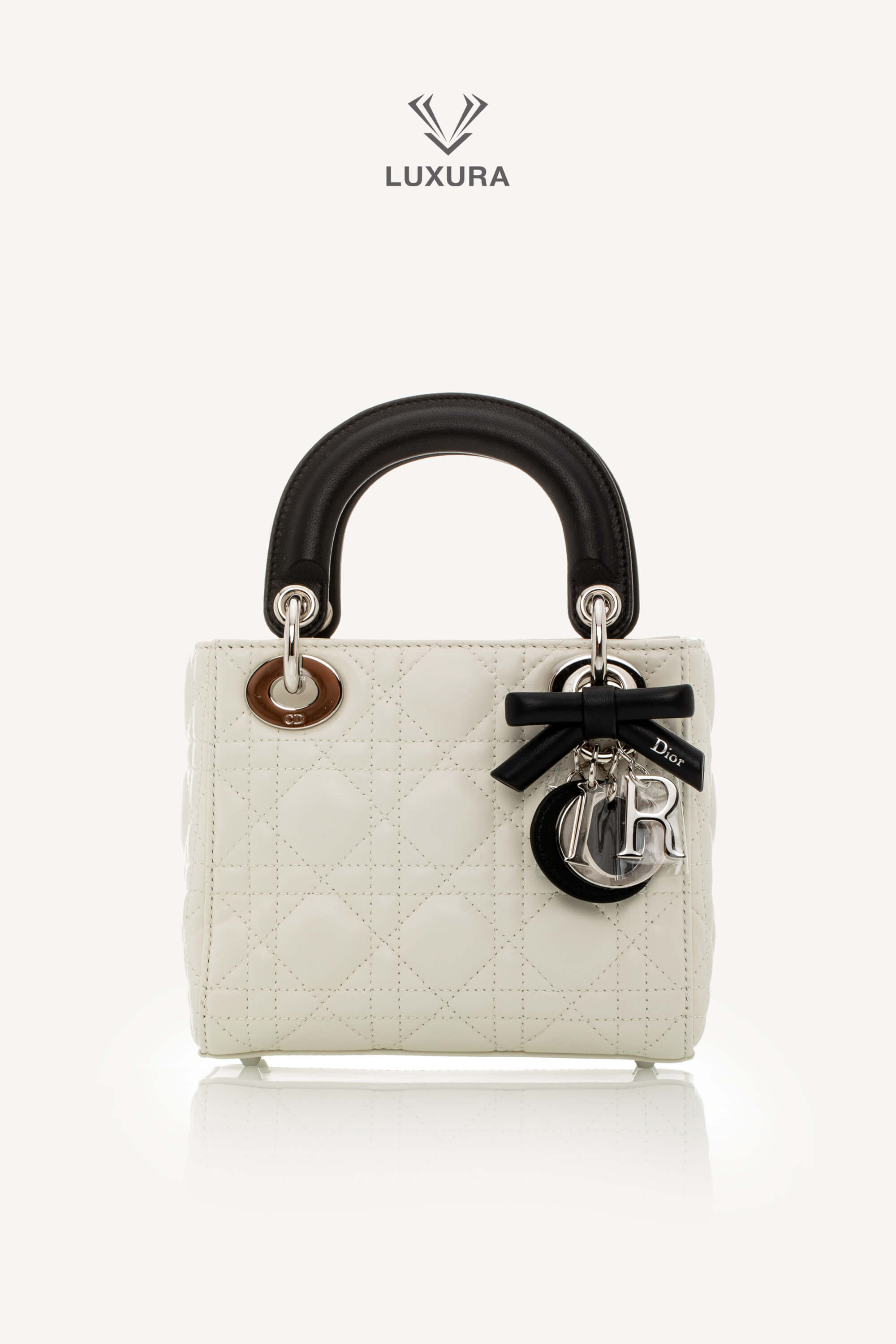 <span style="font-size: 10px;letter-spacing: .15em">NEW COLLECTION</span><br> <strong>DIOR</strong><br> <div style="margin-top:10px;font-size:16px">Mini Lady Dior Bag with Chain Two-Tone Latte and Black Cannage Lambskin</div><br> - Image 5