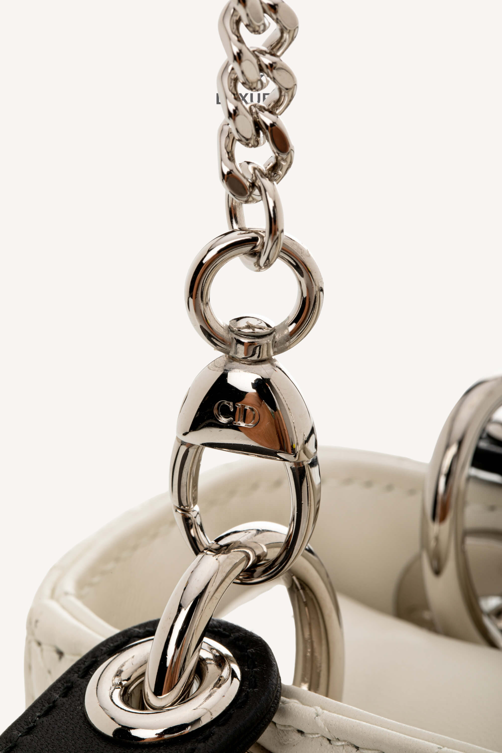 <span style="font-size: 10px;letter-spacing: .15em">NEW COLLECTION</span><br> <strong>DIOR</strong><br> <div style="margin-top:10px;font-size:16px">Mini Lady Dior Bag with Chain Two-Tone Latte and Black Cannage Lambskin</div><br> - Image 24