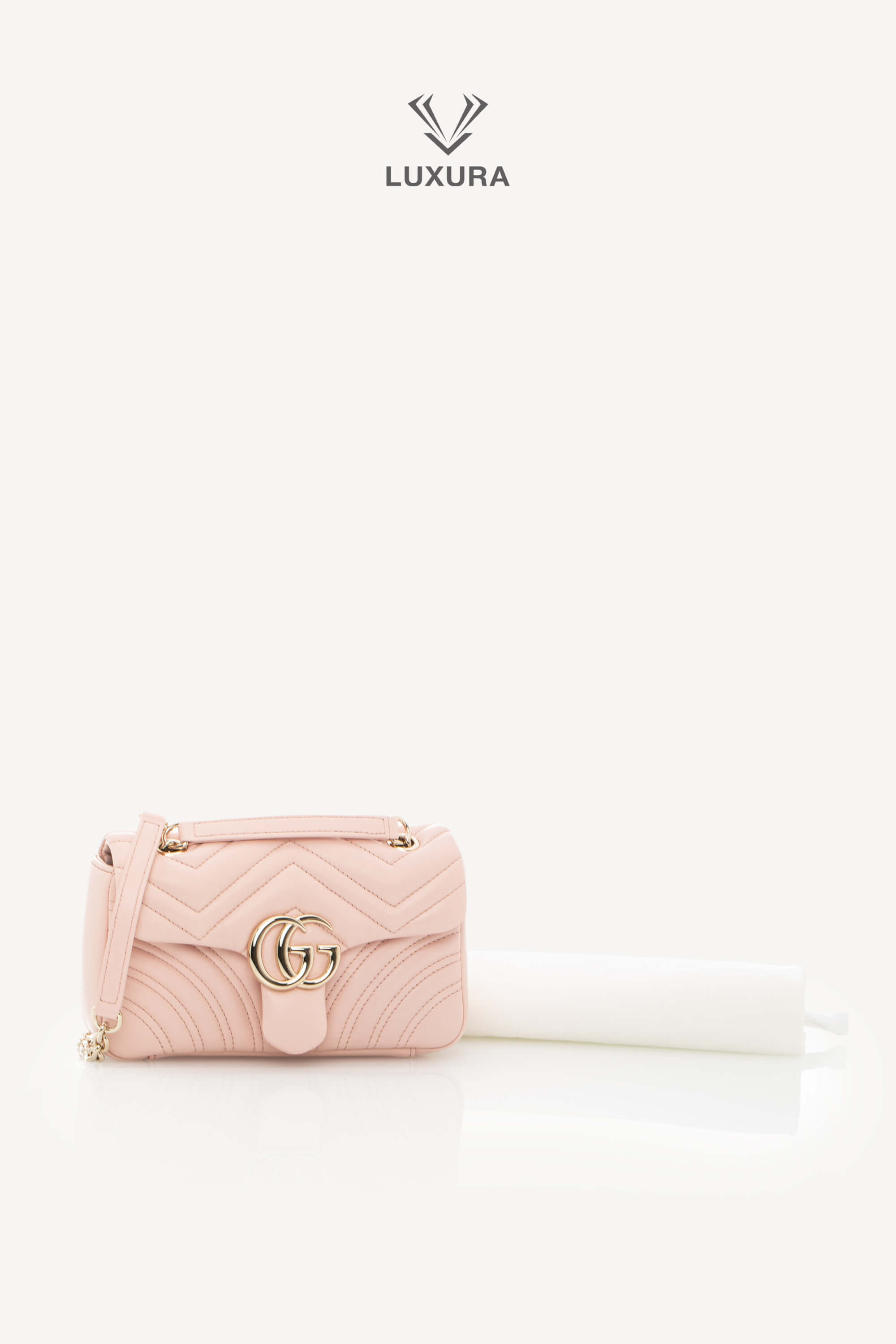 <span style="font-size: 10px;letter-spacing: .15em">NEW COLLECTION</span><br> <strong>GUCCI</strong><br> <div style="margin-top:10px;font-size:16px">Marmont Small Shoulder Bag Light Pink Skin</div><br> - Image 2