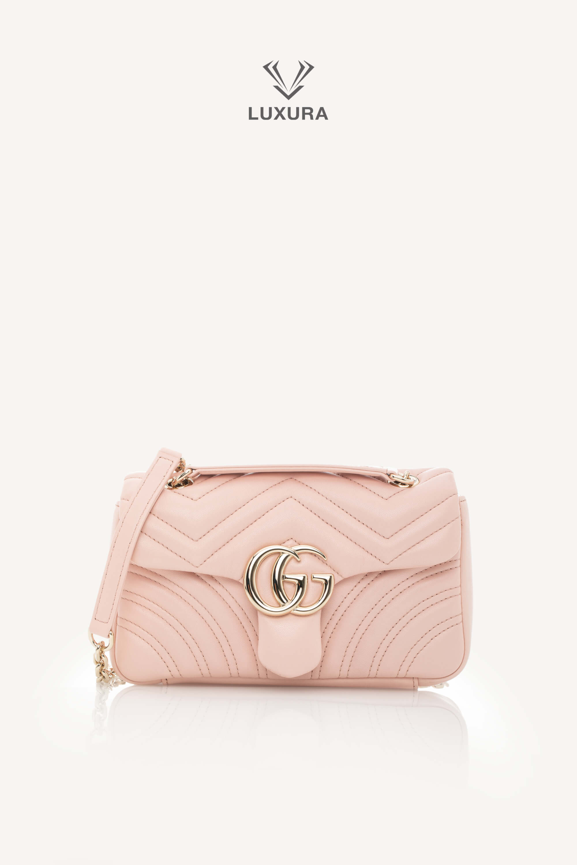 <span style="font-size: 10px;letter-spacing: .15em">NEW COLLECTION</span><br> <strong>GUCCI</strong><br> <div style="margin-top:10px;font-size:16px">Marmont Small Shoulder Bag Light Pink Skin</div><br>
