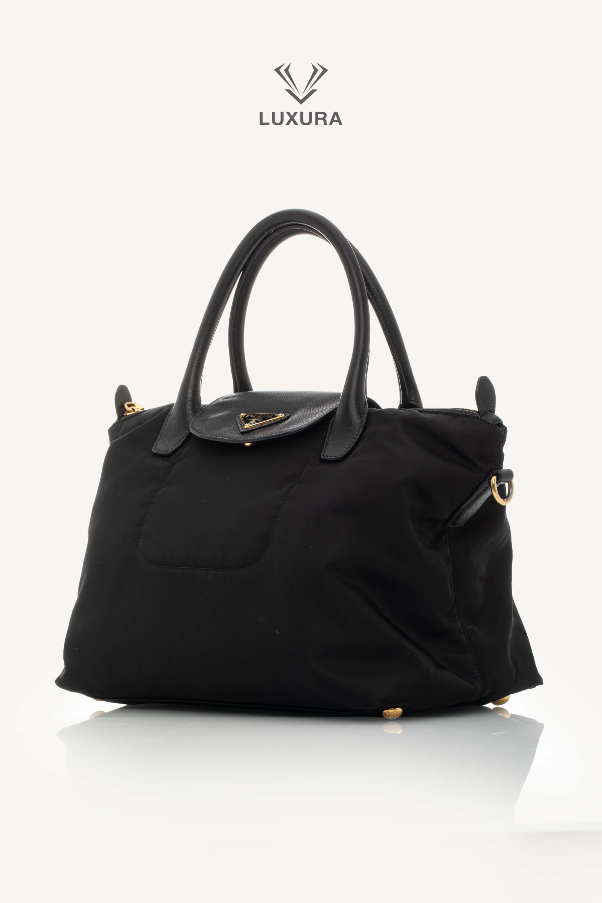 <span style="font-size: 10px;letter-spacing: .15em">BEST DEAL</span><br> <strong>PRADA</strong><br> <div style="margin-top:10px;font-size:16px">Black Nylon and Saffiano Leather Zip Satchel</div><br> - Image 7