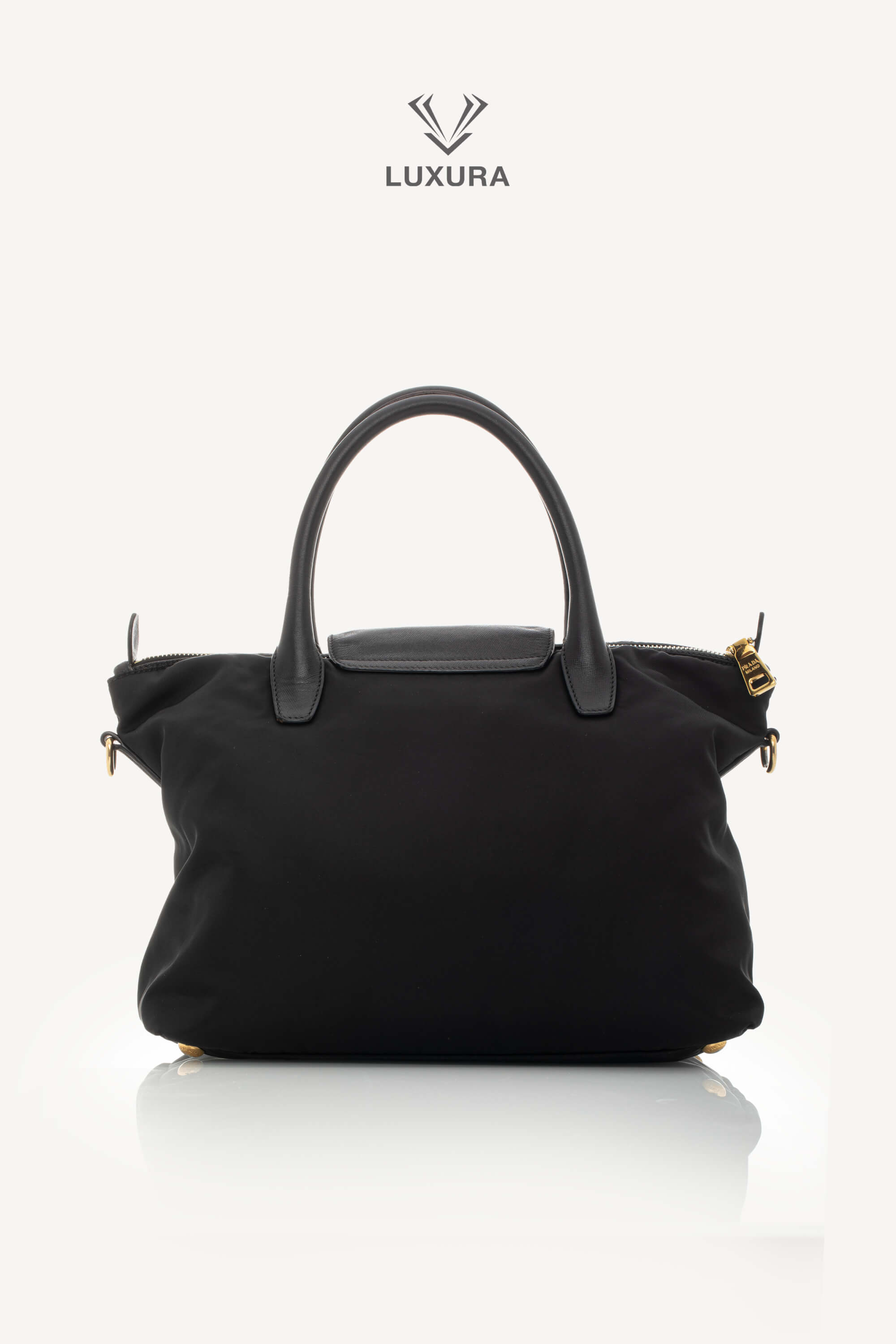 <span style="font-size: 10px;letter-spacing: .15em">BEST DEAL</span><br> <strong>PRADA</strong><br> <div style="margin-top:10px;font-size:16px">Black Nylon and Saffiano Leather Zip Satchel</div><br> - Image 6
