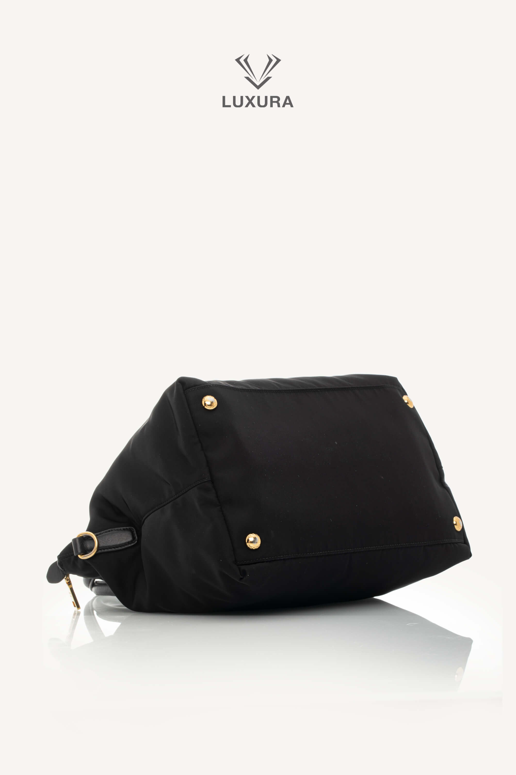 <span style="font-size: 10px;letter-spacing: .15em">BEST DEAL</span><br> <strong>PRADA</strong><br> <div style="margin-top:10px;font-size:16px">Black Nylon and Saffiano Leather Zip Satchel</div><br> - Image 21
