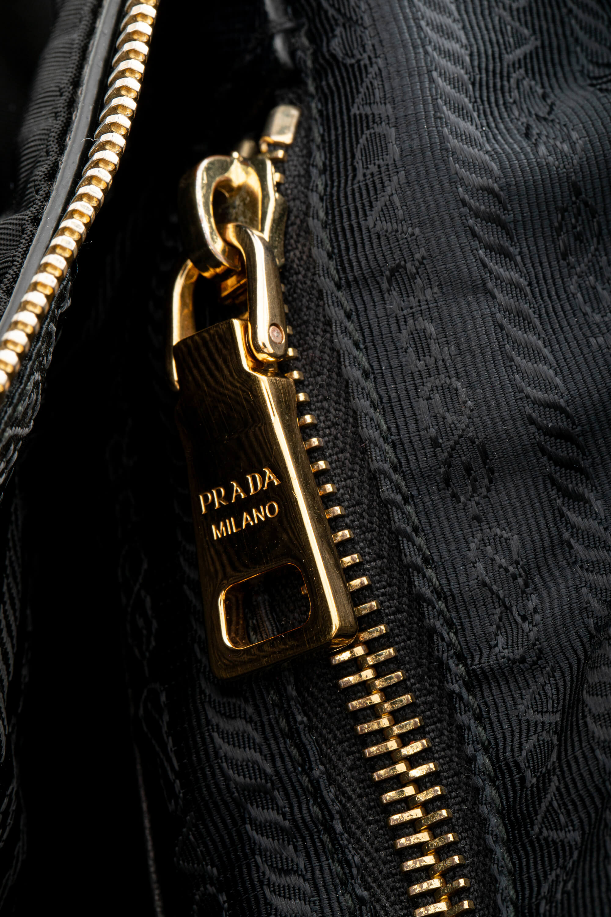 <span style="font-size: 10px;letter-spacing: .15em">BEST DEAL</span><br> <strong>PRADA</strong><br> <div style="margin-top:10px;font-size:16px">Black Nylon and Saffiano Leather Zip Satchel</div><br> - Image 13