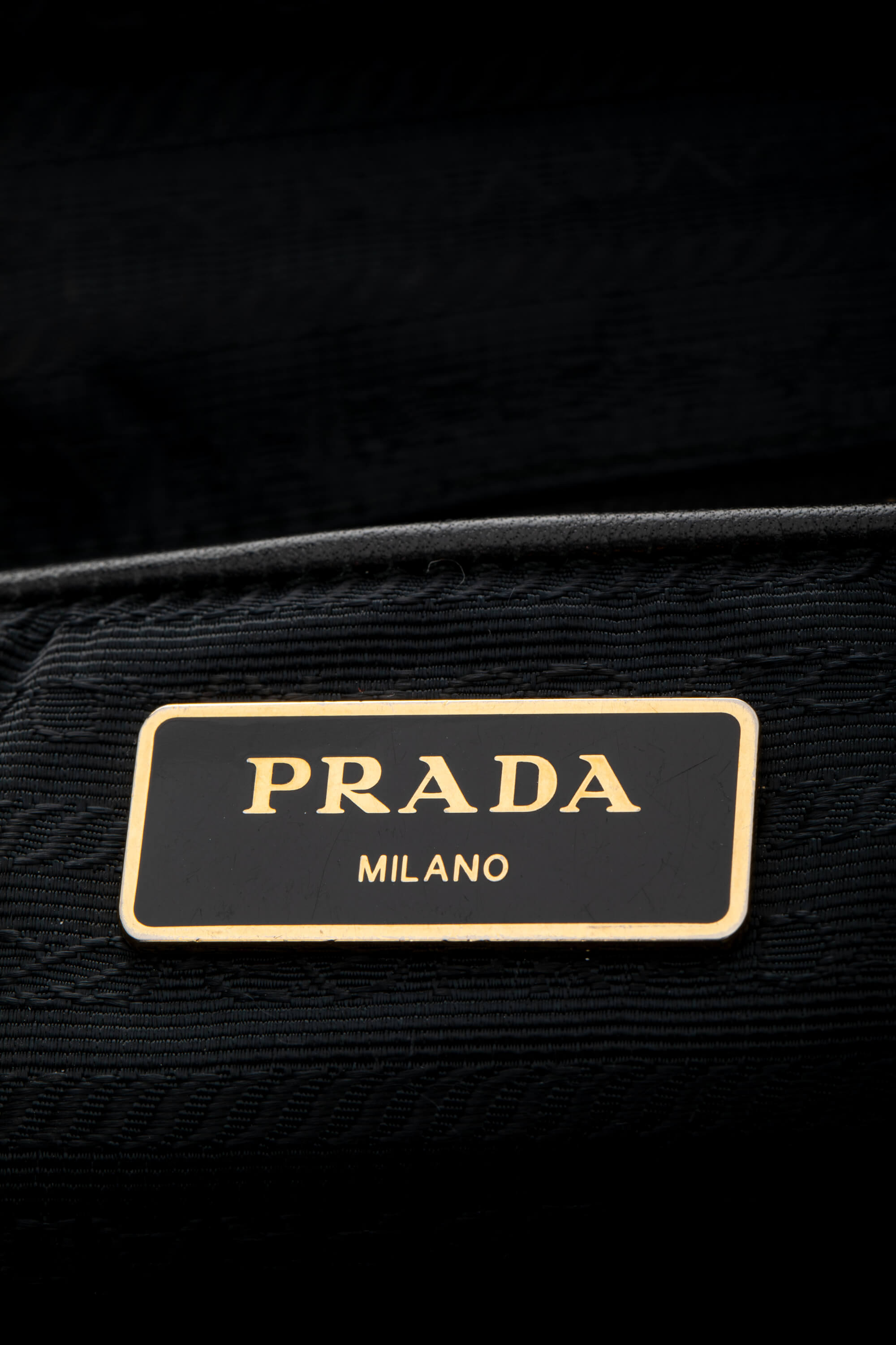 <span style="font-size: 10px;letter-spacing: .15em">BEST DEAL</span><br> <strong>PRADA</strong><br> <div style="margin-top:10px;font-size:16px">Black Nylon and Saffiano Leather Zip Satchel</div><br> - Image 12