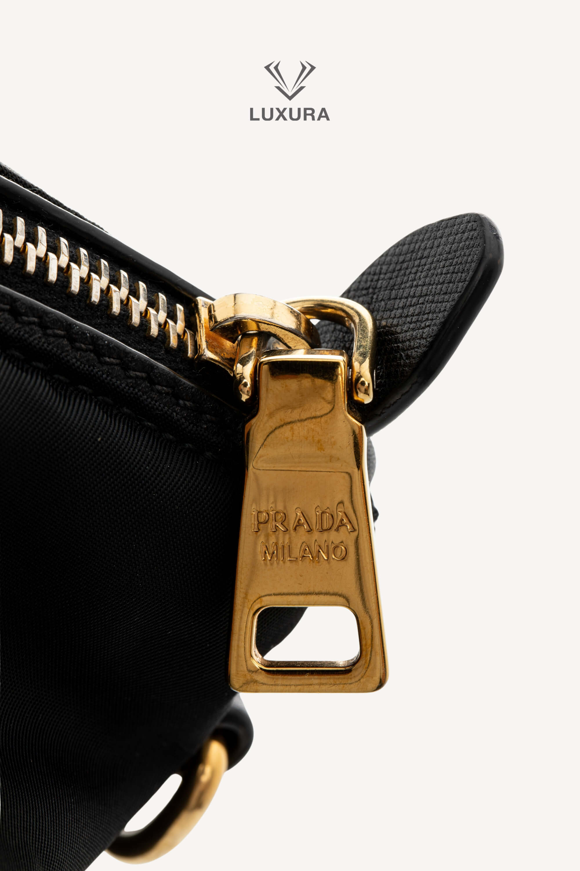 <span style="font-size: 10px;letter-spacing: .15em">BEST DEAL</span><br> <strong>PRADA</strong><br> <div style="margin-top:10px;font-size:16px">Black Nylon and Saffiano Leather Zip Satchel</div><br> - Image 16