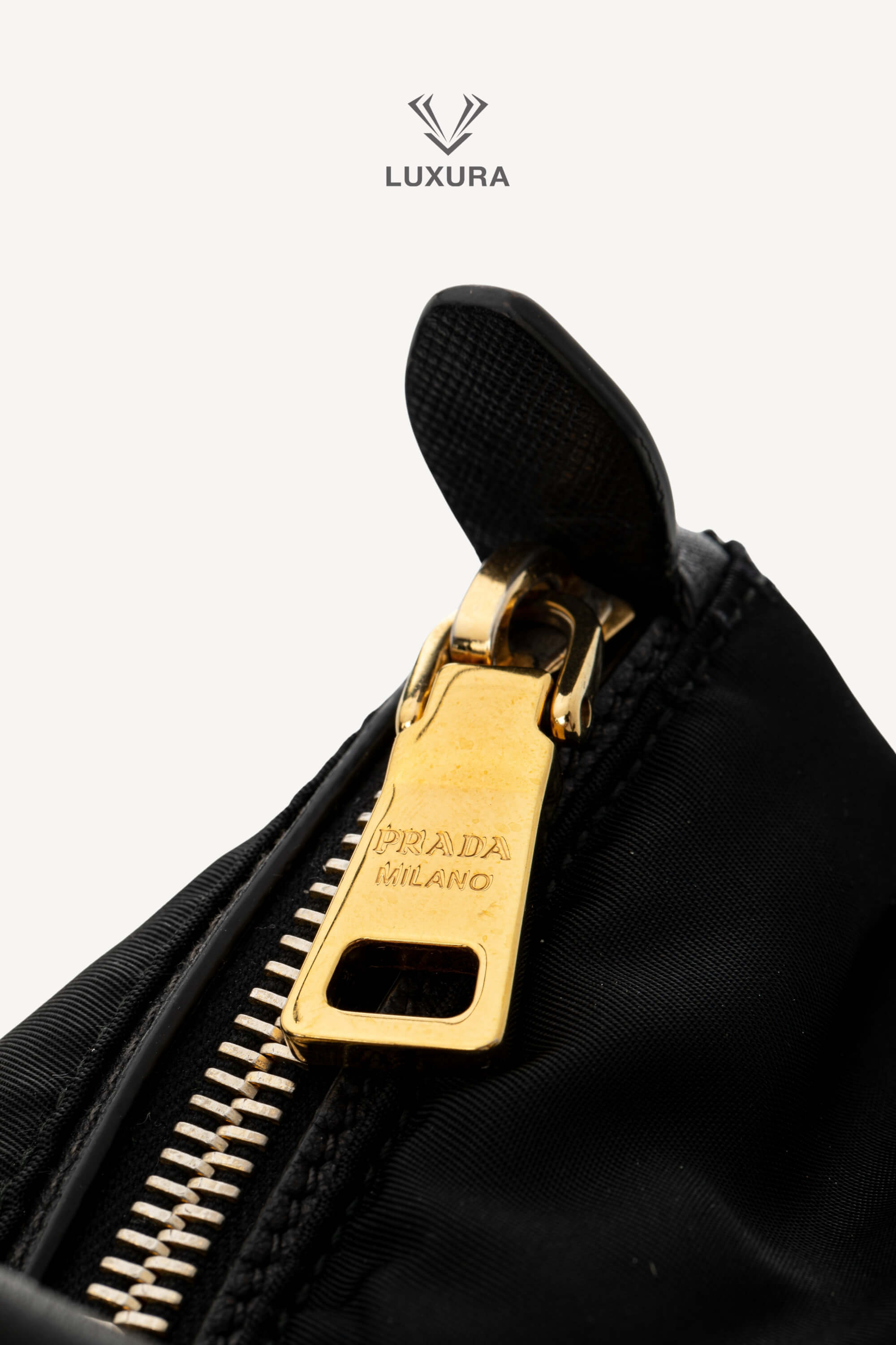 <span style="font-size: 10px;letter-spacing: .15em">BEST DEAL</span><br> <strong>PRADA</strong><br> <div style="margin-top:10px;font-size:16px">Black Nylon and Saffiano Leather Zip Satchel</div><br> - Image 18