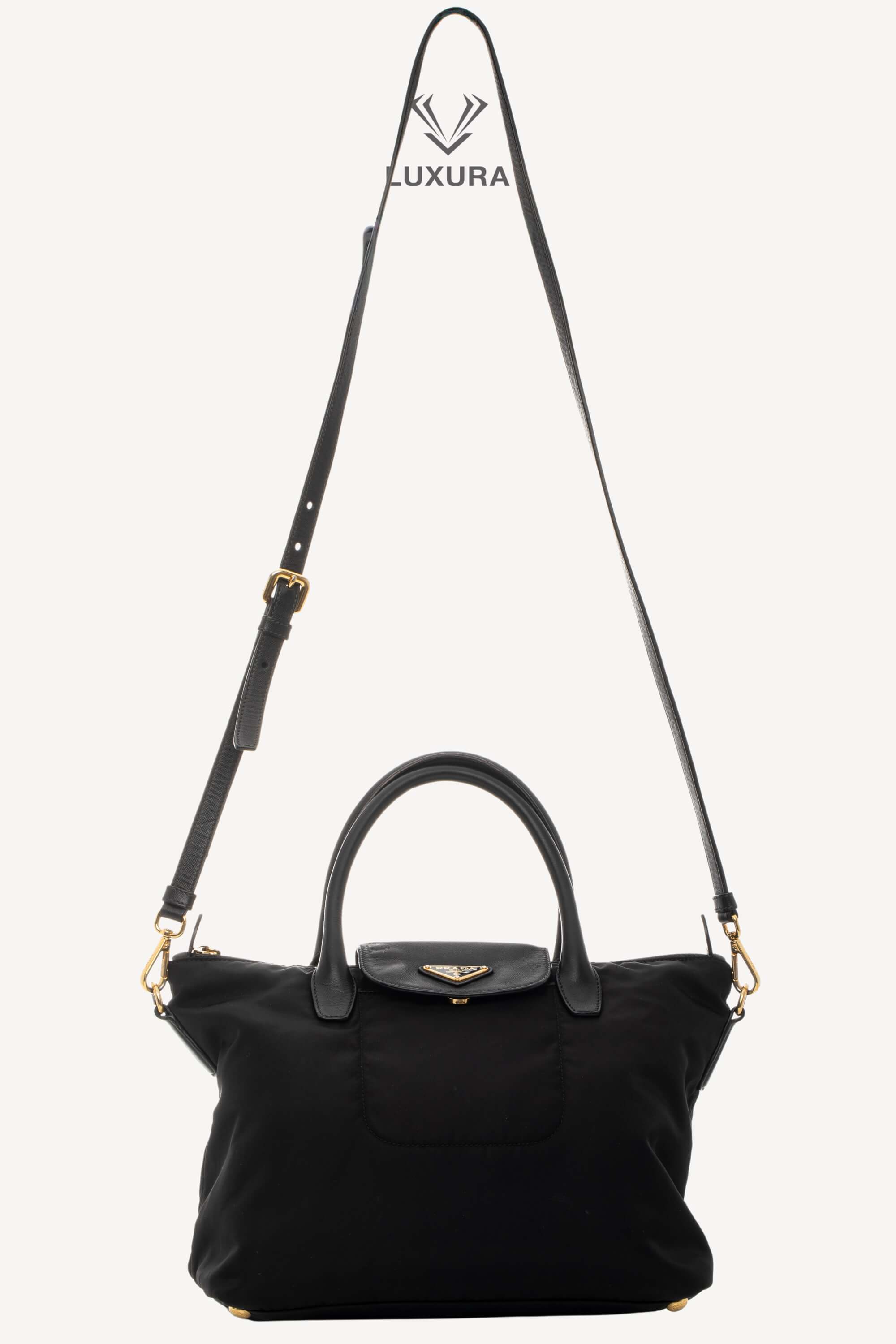 <span style="font-size: 10px;letter-spacing: .15em">BEST DEAL</span><br> <strong>PRADA</strong><br> <div style="margin-top:10px;font-size:16px">Black Nylon and Saffiano Leather Zip Satchel</div><br> - Image 5