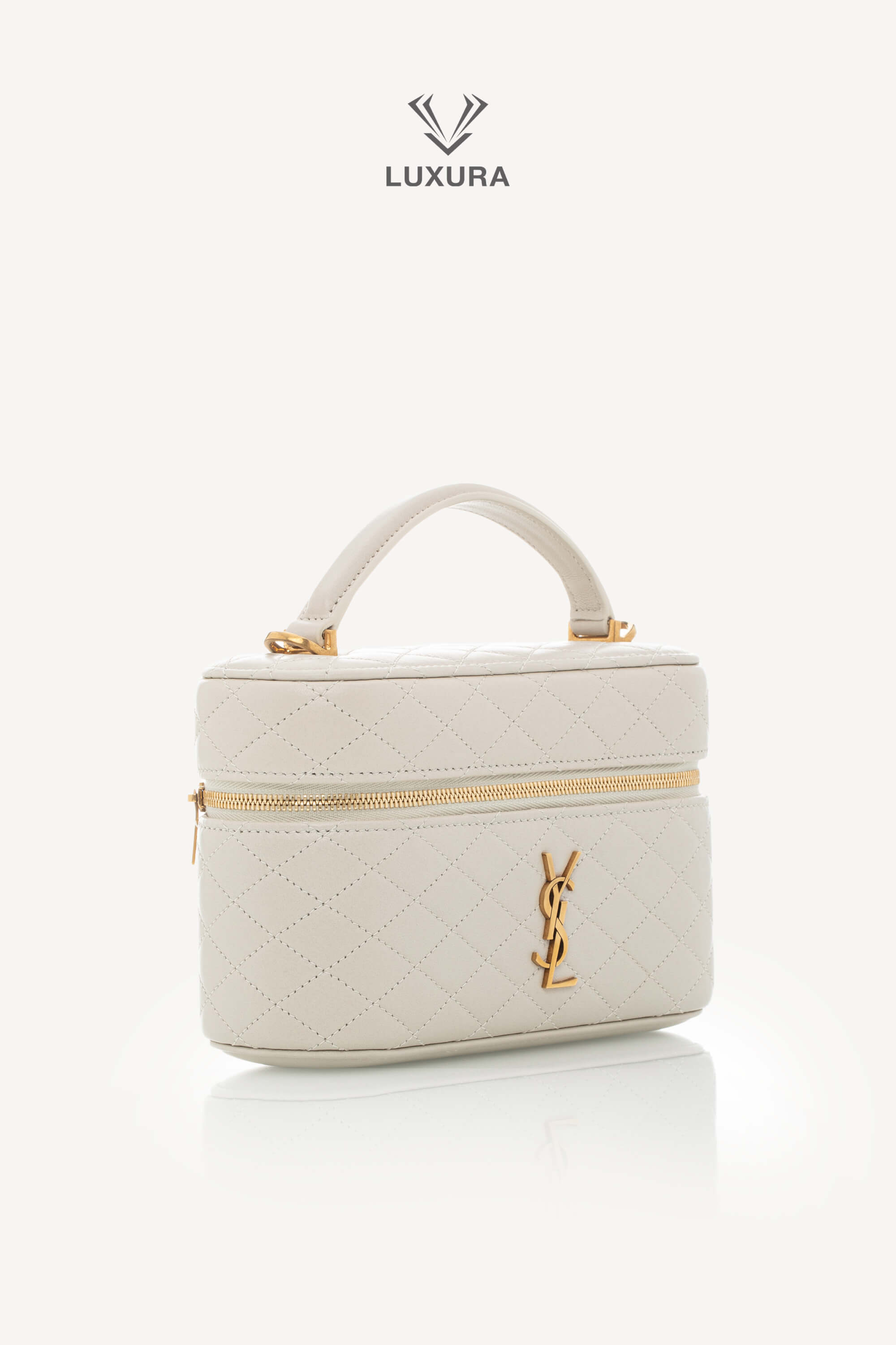 <span style="font-size: 10px;letter-spacing: .15em">NEW COLLECTION</span><br> <strong>SAINT LAURENT</strong><br> <div style="margin-top:10px;font-size:16px">Gaby Vanity Mini Quilted Leather Shoulder Bag Off-White</div><br> - Image 2