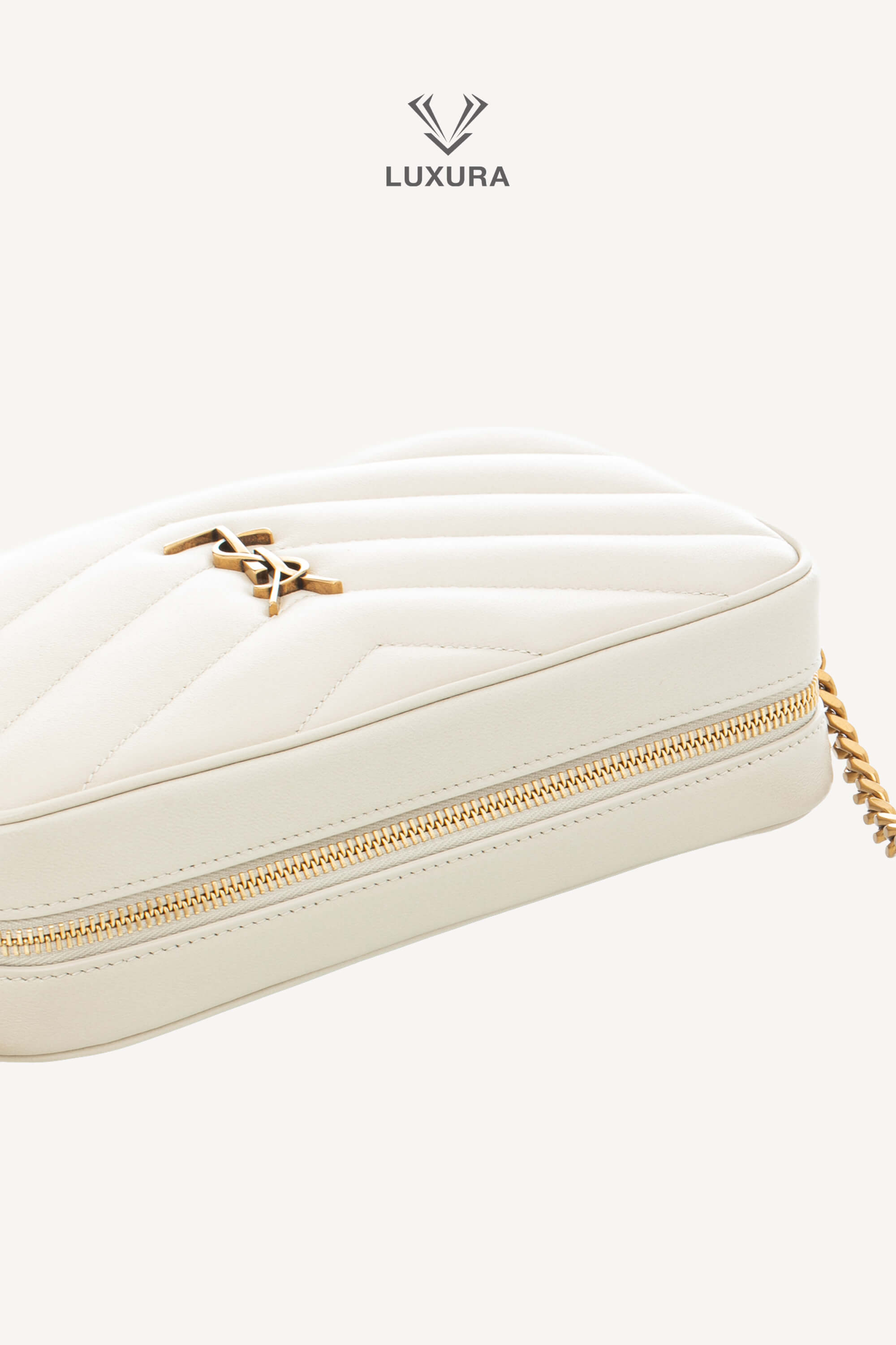 <span style="font-size: 10px;letter-spacing: .15em">NEW COLLECTION</span><br> <strong>SAINT LAURENT</strong><br> <div style="margin-top:10px;font-size:16px">Loulou Camera Bag In Quilted Leather Crema Soft</div><br> - Image 9