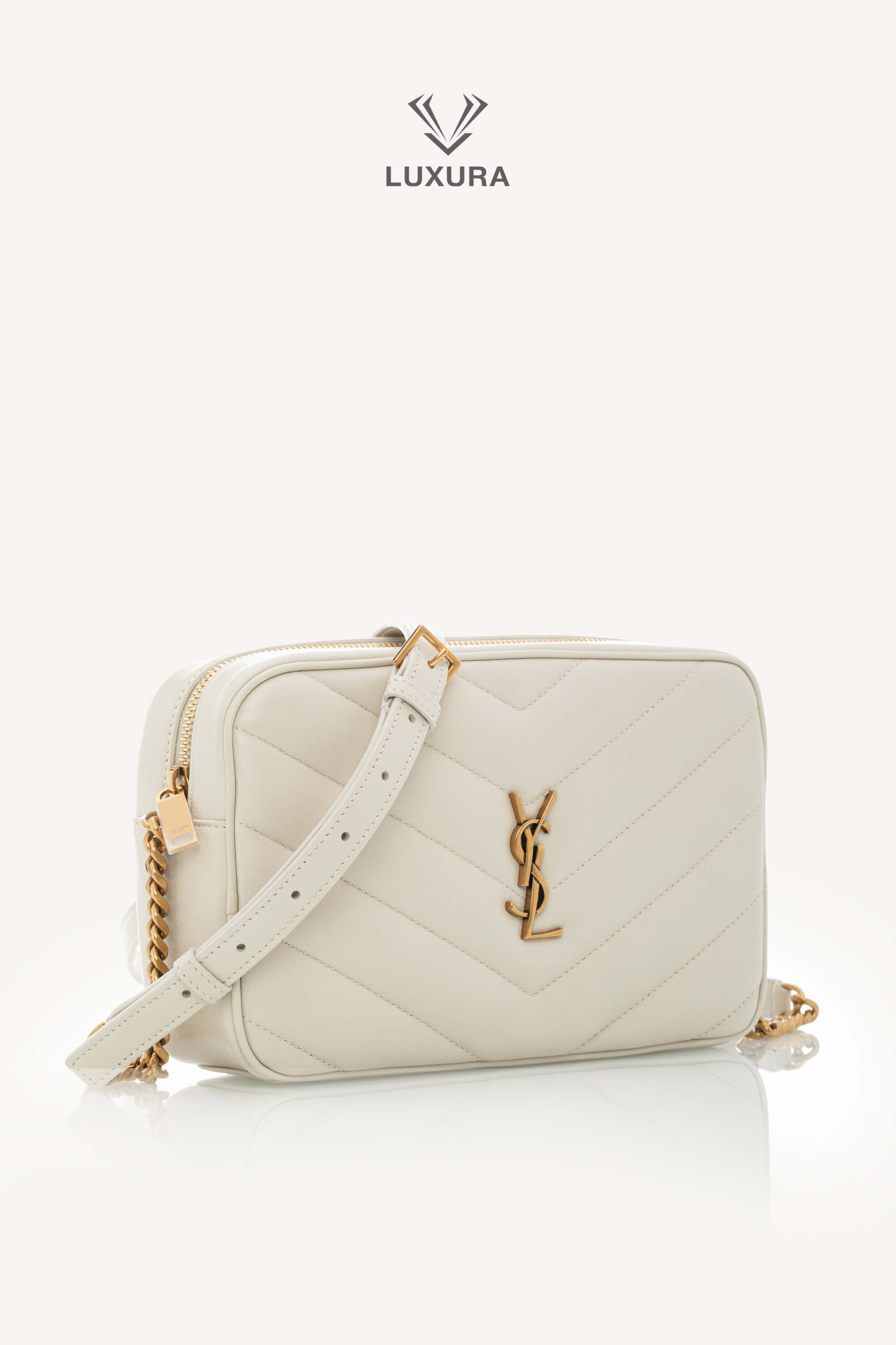 <span style="font-size: 10px;letter-spacing: .15em">NEW COLLECTION</span><br> <strong>SAINT LAURENT</strong><br> <div style="margin-top:10px;font-size:16px">Loulou Camera Bag In Quilted Leather Crema Soft</div><br> - Image 3