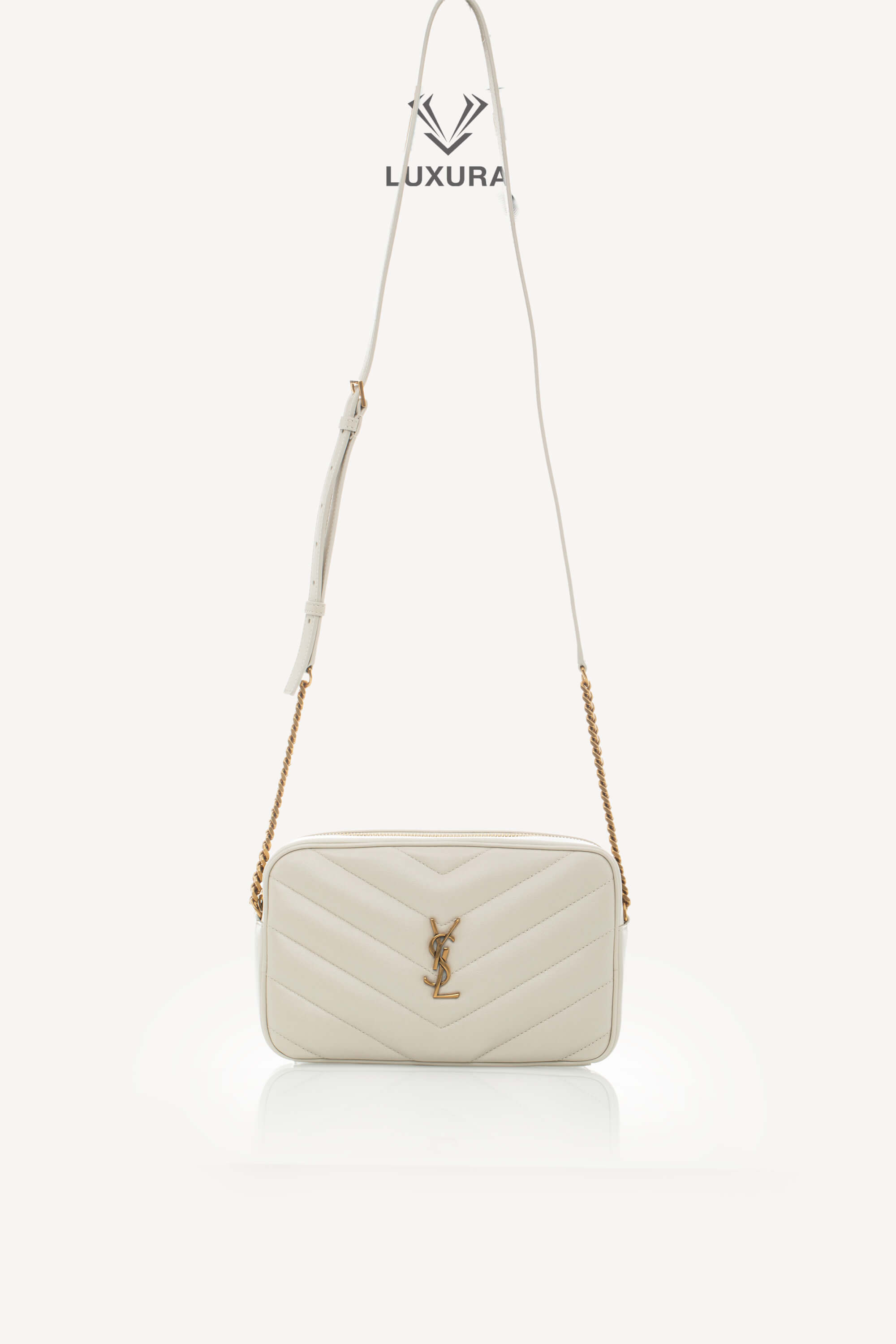 <span style="font-size: 10px;letter-spacing: .15em">NEW COLLECTION</span><br> <strong>SAINT LAURENT</strong><br> <div style="margin-top:10px;font-size:16px">Loulou Camera Bag In Quilted Leather Crema Soft</div><br> - Image 4