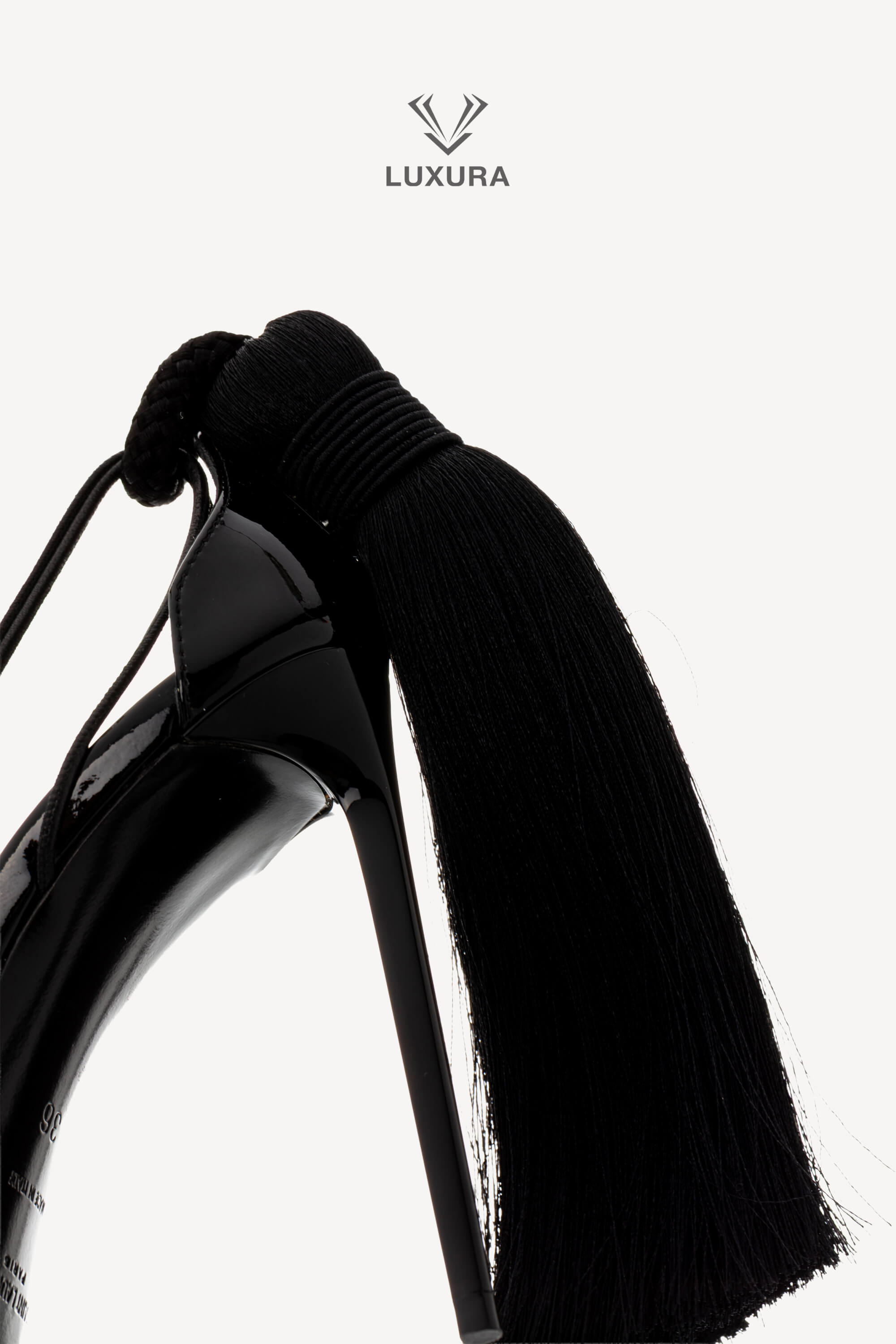 <span style="font-size: 10px;letter-spacing: .15em">HARD TO FIND</span><br>            <strong>SAINT LAURENT</strong><br>            <div style="margin-top:10px;font-size:16px">Patent Leather Zoe 105 Tassel Wrap Pumps Black 36</div><br> - Image 10