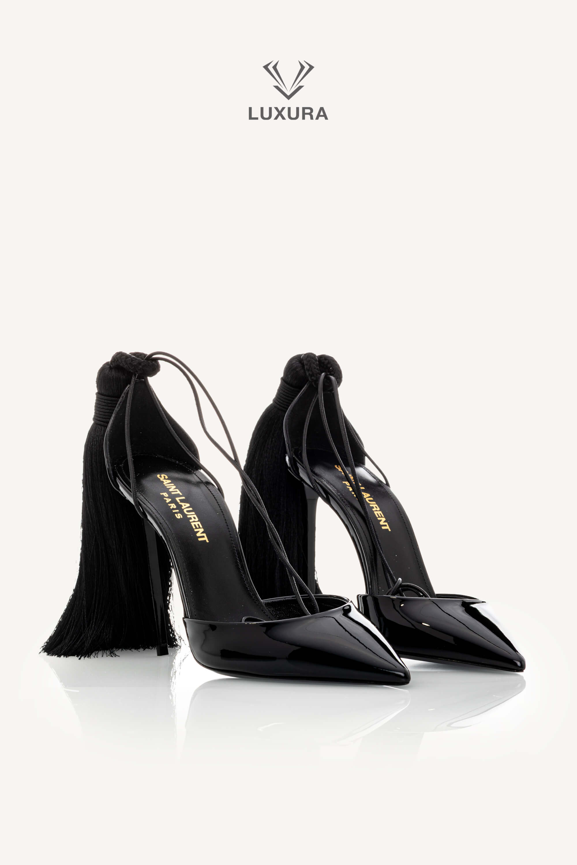 <span style="font-size: 10px;letter-spacing: .15em">HARD TO FIND</span><br>            <strong>SAINT LAURENT</strong><br>            <div style="margin-top:10px;font-size:16px">Patent Leather Zoe 105 Tassel Wrap Pumps Black 36</div><br> - Image 3