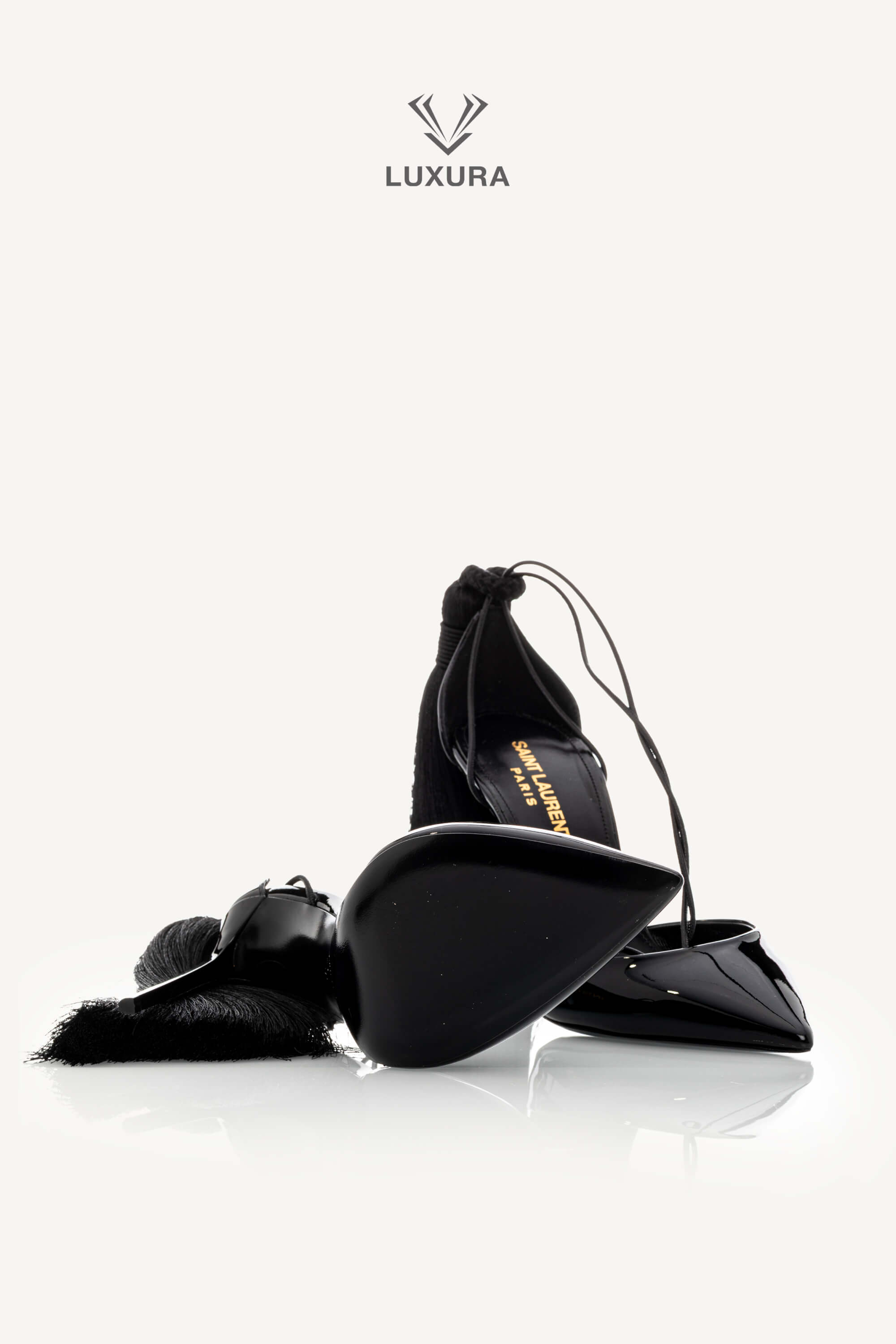 <span style="font-size: 10px;letter-spacing: .15em">HARD TO FIND</span><br>            <strong>SAINT LAURENT</strong><br>            <div style="margin-top:10px;font-size:16px">Patent Leather Zoe 105 Tassel Wrap Pumps Black 36</div><br> - Image 17