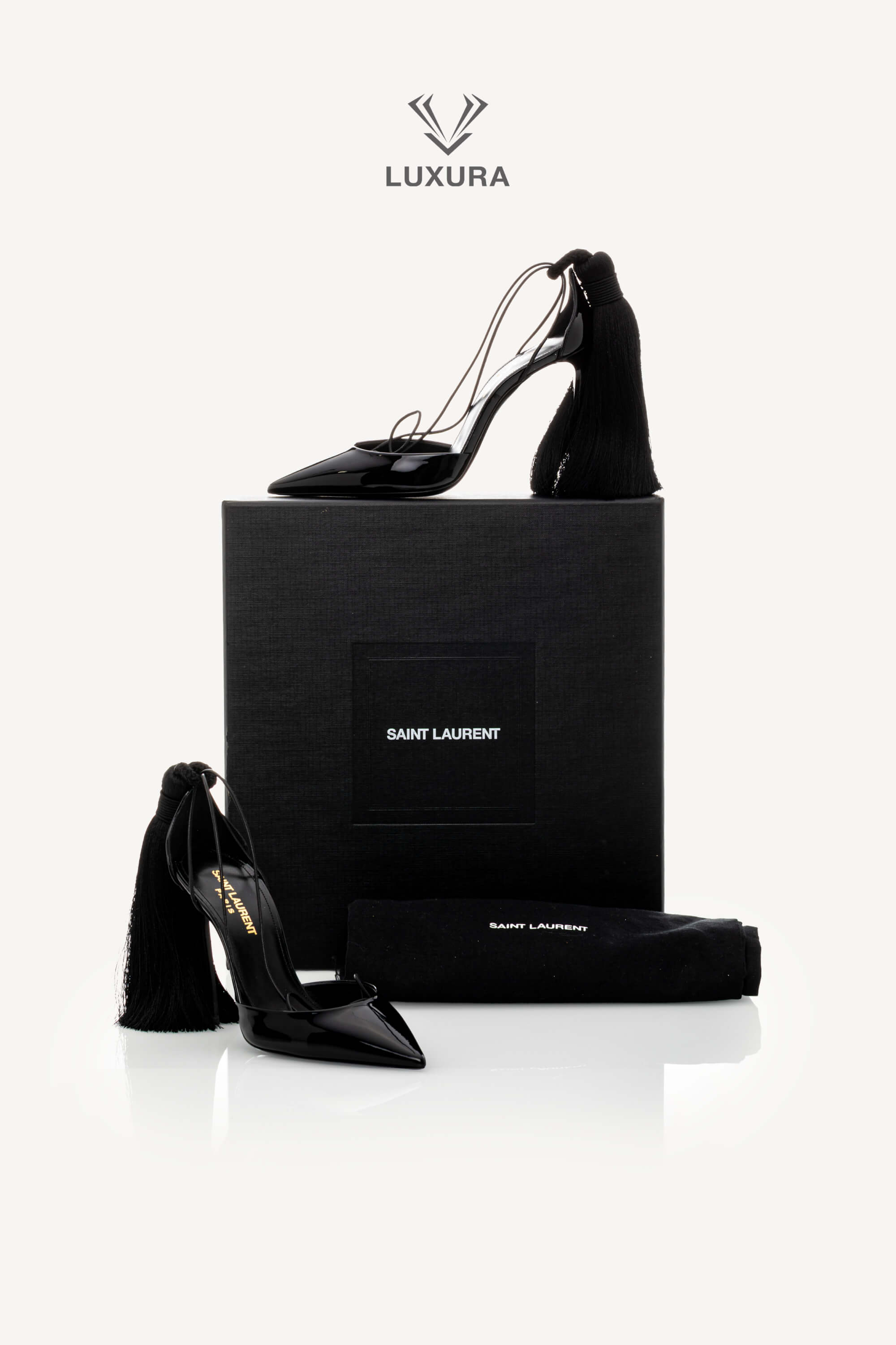 <span style="font-size: 10px;letter-spacing: .15em">HARD TO FIND</span><br>            <strong>SAINT LAURENT</strong><br>            <div style="margin-top:10px;font-size:16px">Patent Leather Zoe 105 Tassel Wrap Pumps Black 36</div><br> - Image 2
