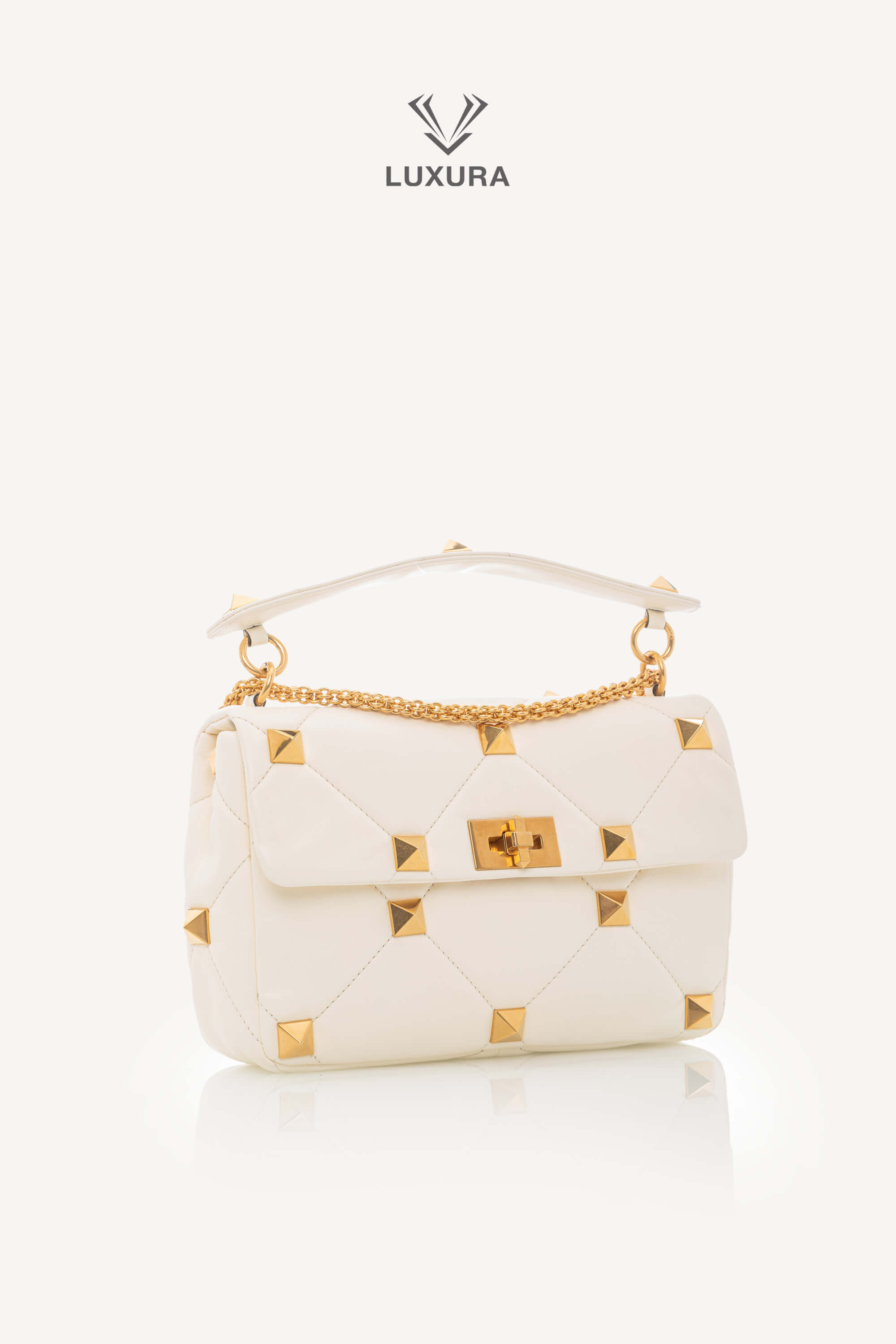 <span style="font-size: 10px;letter-spacing: .15em">BEST DEAL</span><br>            <strong>VALENTINO</strong><br>            <div style="margin-top:10px;font-size:16px">Small Roman Stud the Shoulder Bag in Nappa Ivory</div><br> - Image 3