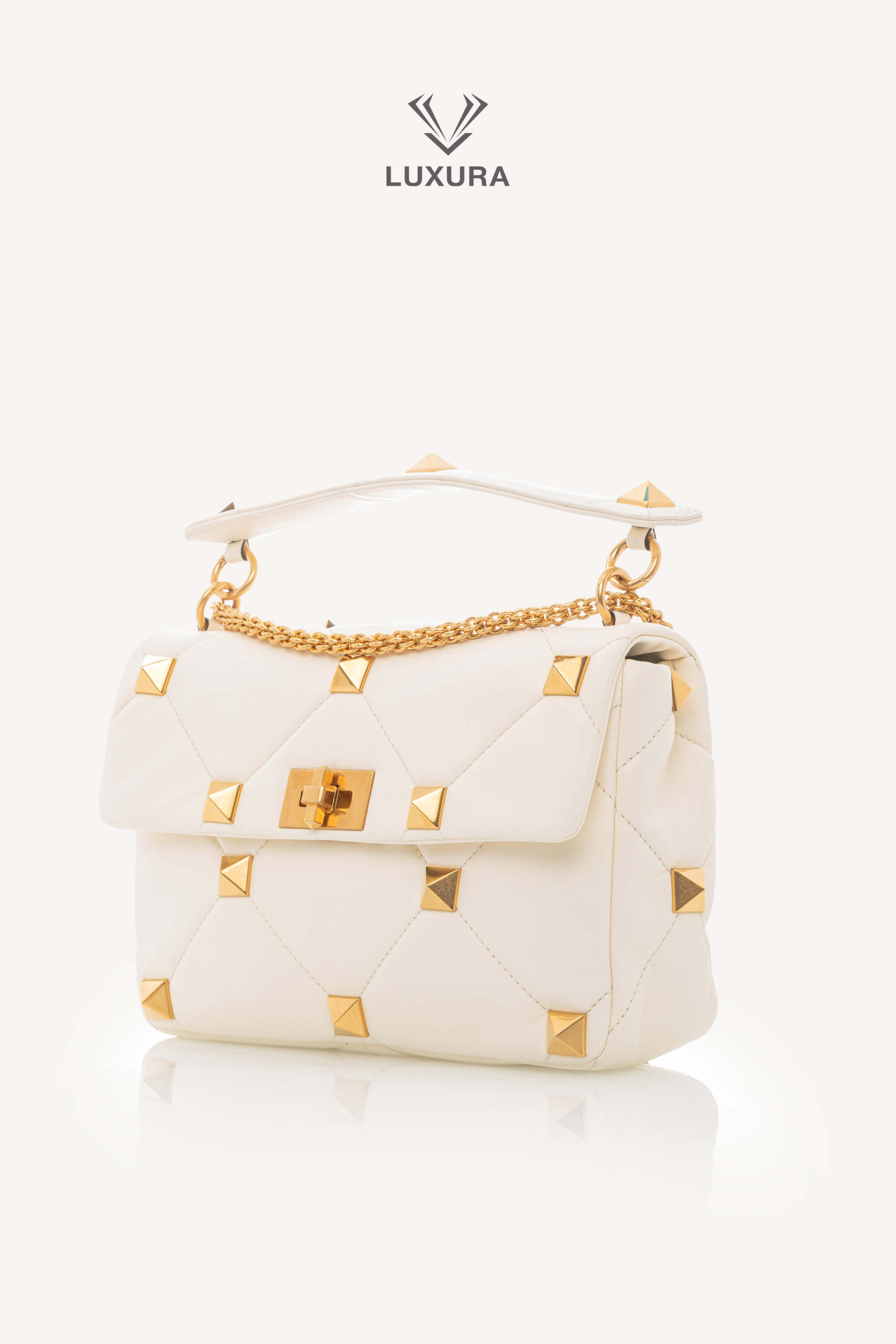 <span style="font-size: 10px;letter-spacing: .15em">BEST DEAL</span><br>            <strong>VALENTINO</strong><br>            <div style="margin-top:10px;font-size:16px">Small Roman Stud the Shoulder Bag in Nappa Ivory</div><br> - Image 8