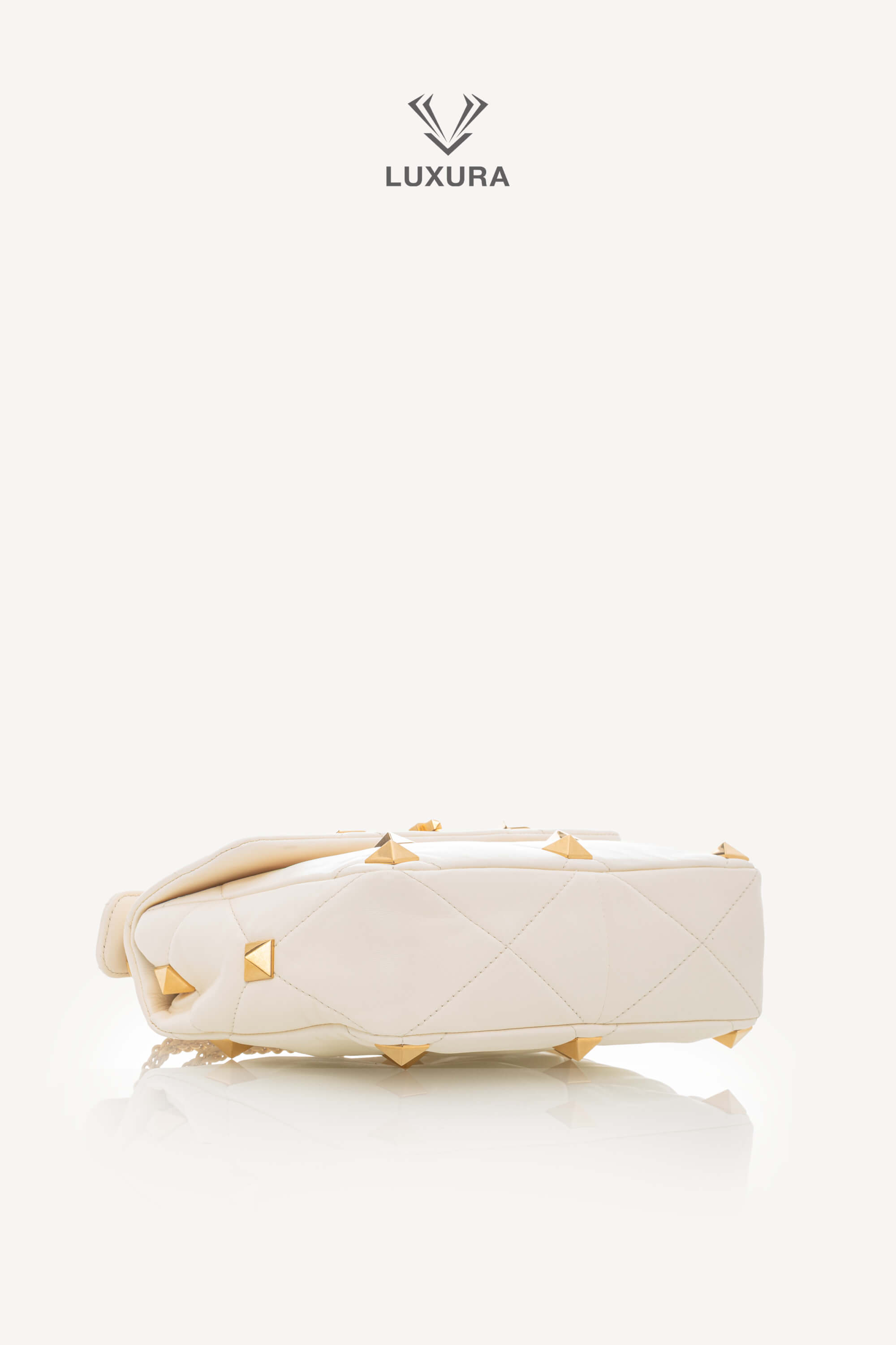 <span style="font-size: 10px;letter-spacing: .15em">BEST DEAL</span><br>            <strong>VALENTINO</strong><br>            <div style="margin-top:10px;font-size:16px">Small Roman Stud the Shoulder Bag in Nappa Ivory</div><br> - Image 23