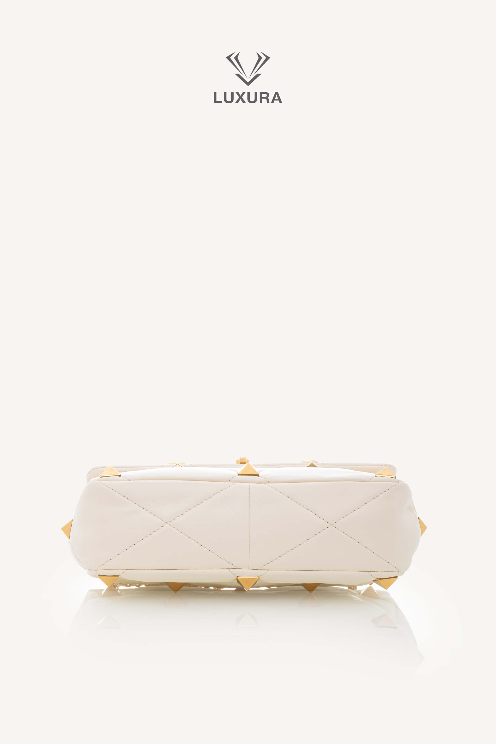 <span style="font-size: 10px;letter-spacing: .15em">BEST DEAL</span><br>            <strong>VALENTINO</strong><br>            <div style="margin-top:10px;font-size:16px">Small Roman Stud the Shoulder Bag in Nappa Ivory</div><br> - Image 24