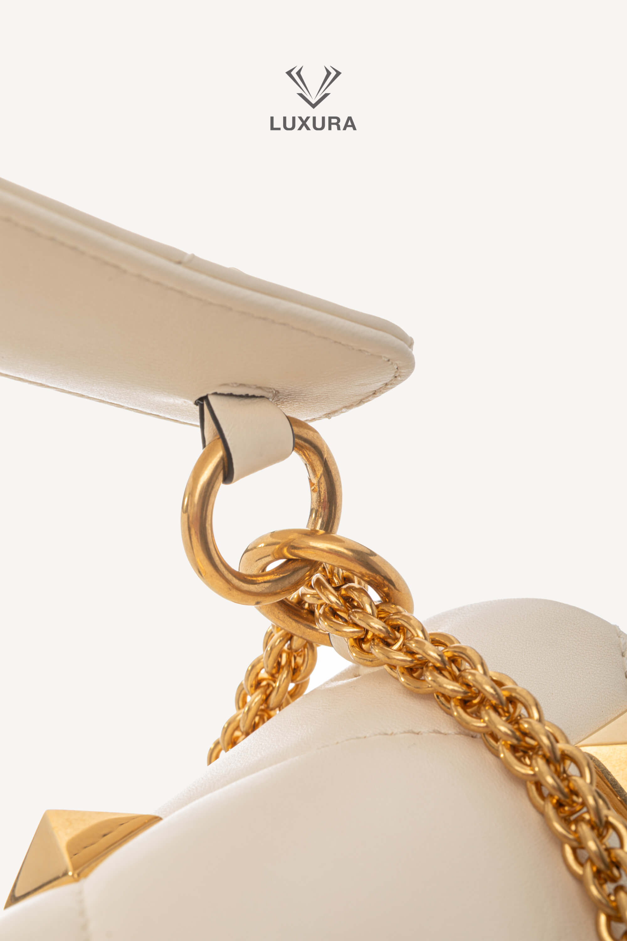 <span style="font-size: 10px;letter-spacing: .15em">BEST DEAL</span><br>            <strong>VALENTINO</strong><br>            <div style="margin-top:10px;font-size:16px">Small Roman Stud the Shoulder Bag in Nappa Ivory</div><br> - Image 20