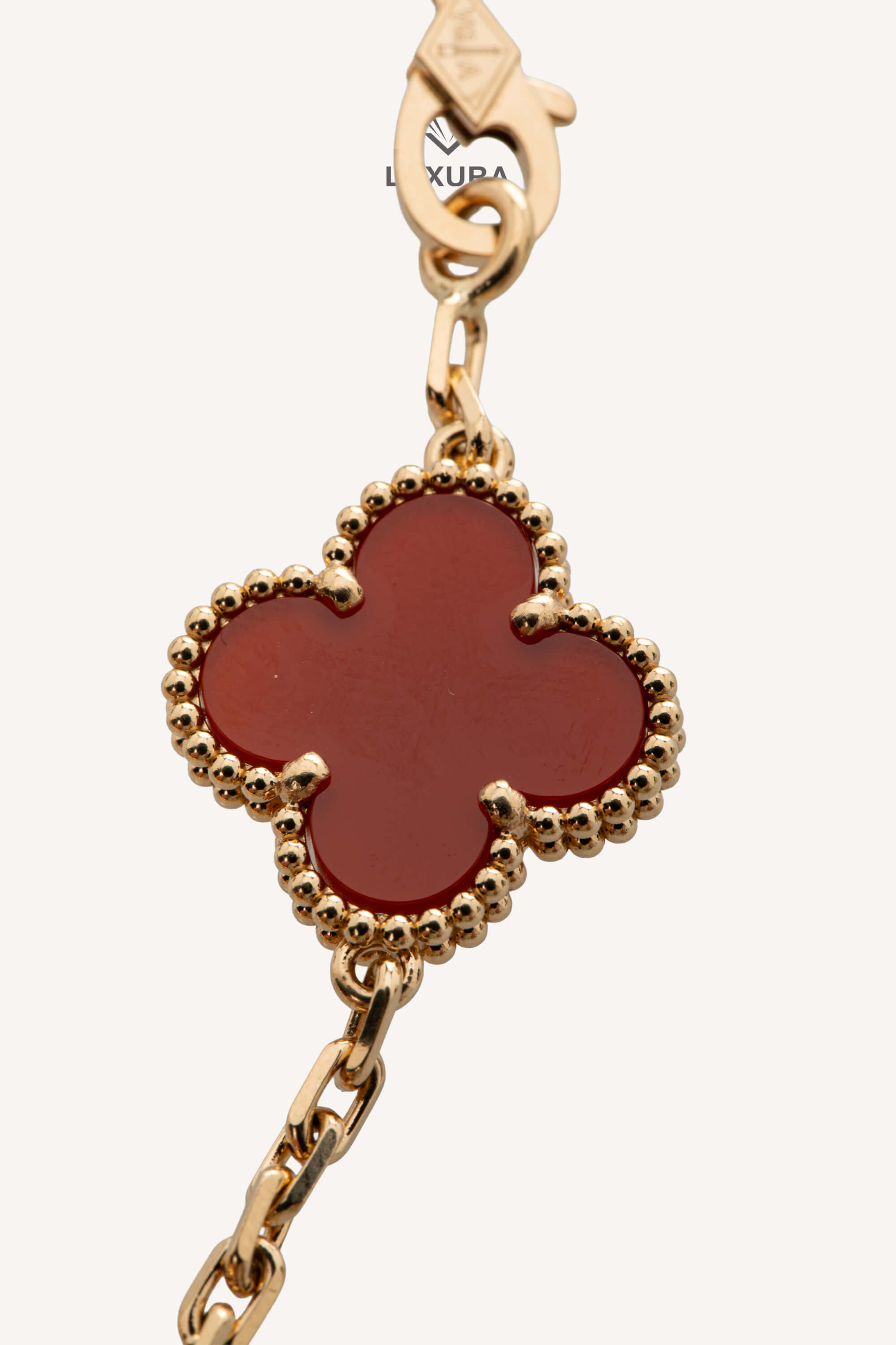 <span style="font-size: 10px;letter-spacing: .15em">HARD TO FIND</span><br> <strong>VAN CLEEF & ARPELS</strong><br> <div style="margin-top:10px;font-size:16px"> 18K Yellow Gold Carnelian Vintage Alhambra Bracelet 5 Motifs</div><br> - Image 10