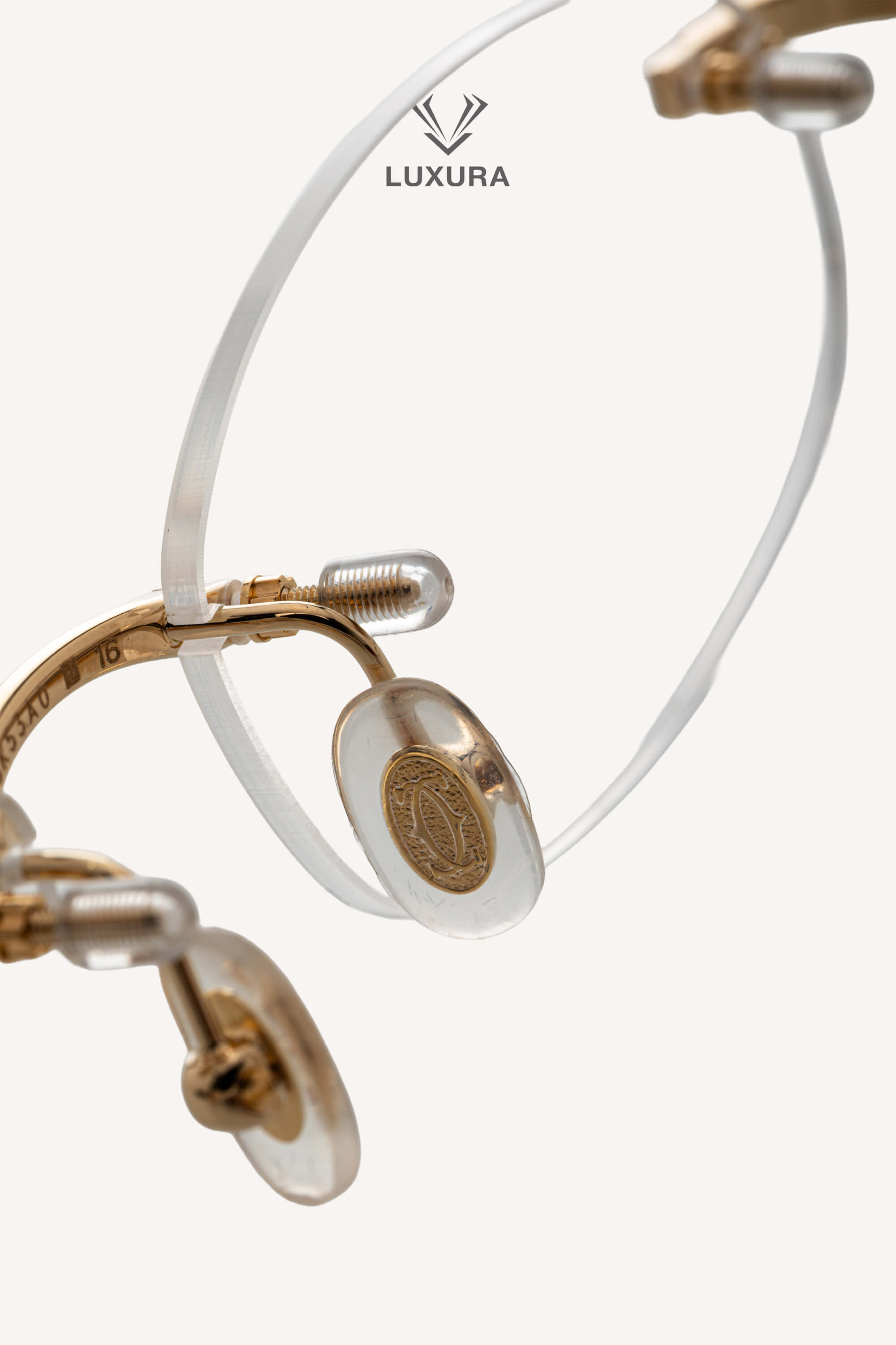 <span style="font-size: 10px;letter-spacing: .15em">BEST DEAL</span><br> <strong>CARTIER</strong><br> <div style="margin-top:10px;font-size:16px">CT0056O-002 Eyeglasses Rimless Shinny Gold-Pearl Chevron</div><br> - Image 10