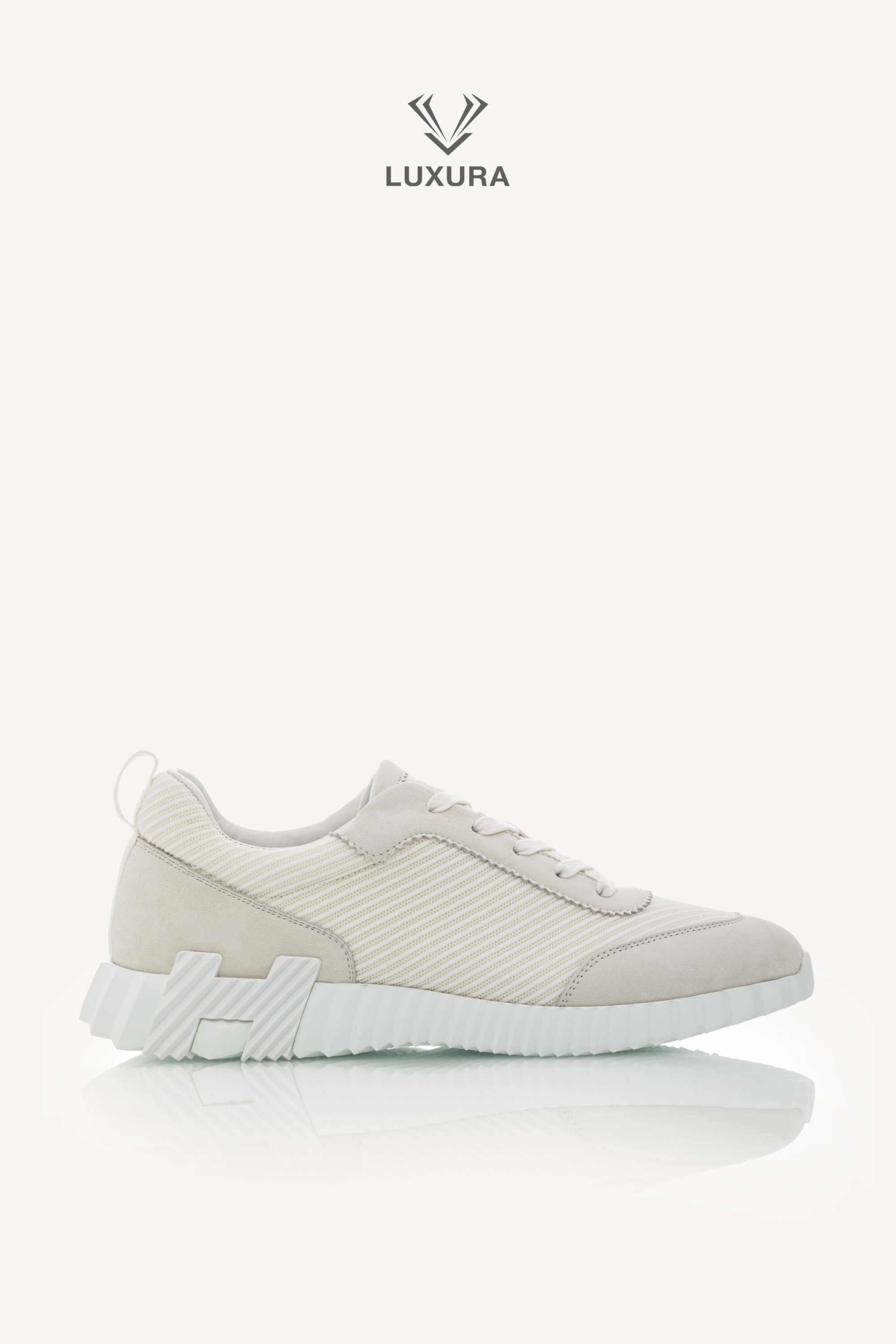 <span style="font-size: 10px;letter-spacing: .15em">HARD TO FIND</span><br> <strong>HERMES</strong><br> <div style="margin-top:10px;font-size:16px">Technical Mesh Suede Goatskin Bouncing Sneaker White 42</div><br>