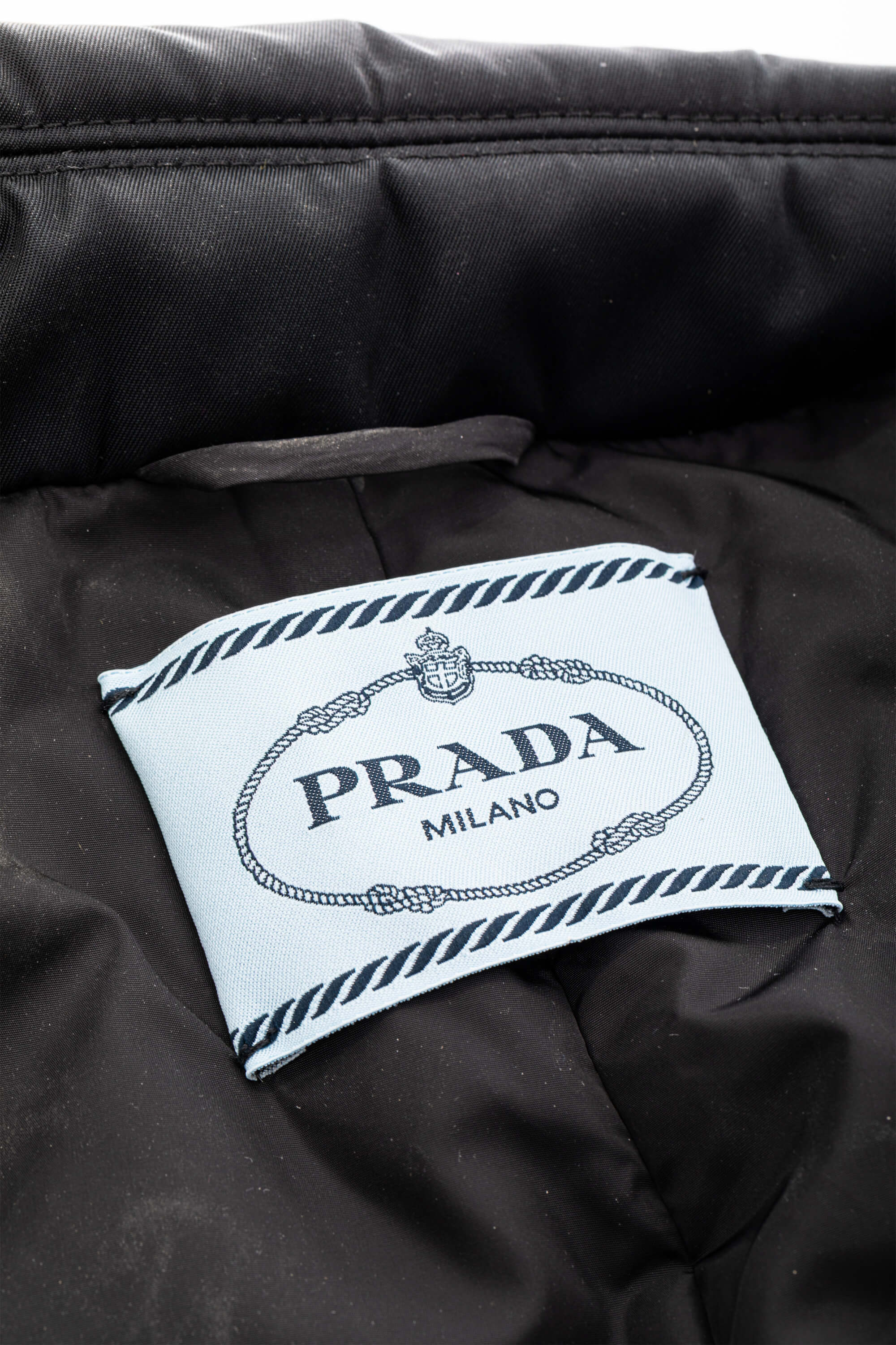 <span style="font-size: 10px;letter-spacing: .15em">BEST DEAL</span><br> <strong>PRADA</strong><br> <div style="margin-top:10px;font-size:16px">Re-Nylon Belted Down Jacket Black 40</div><br> - Image 13