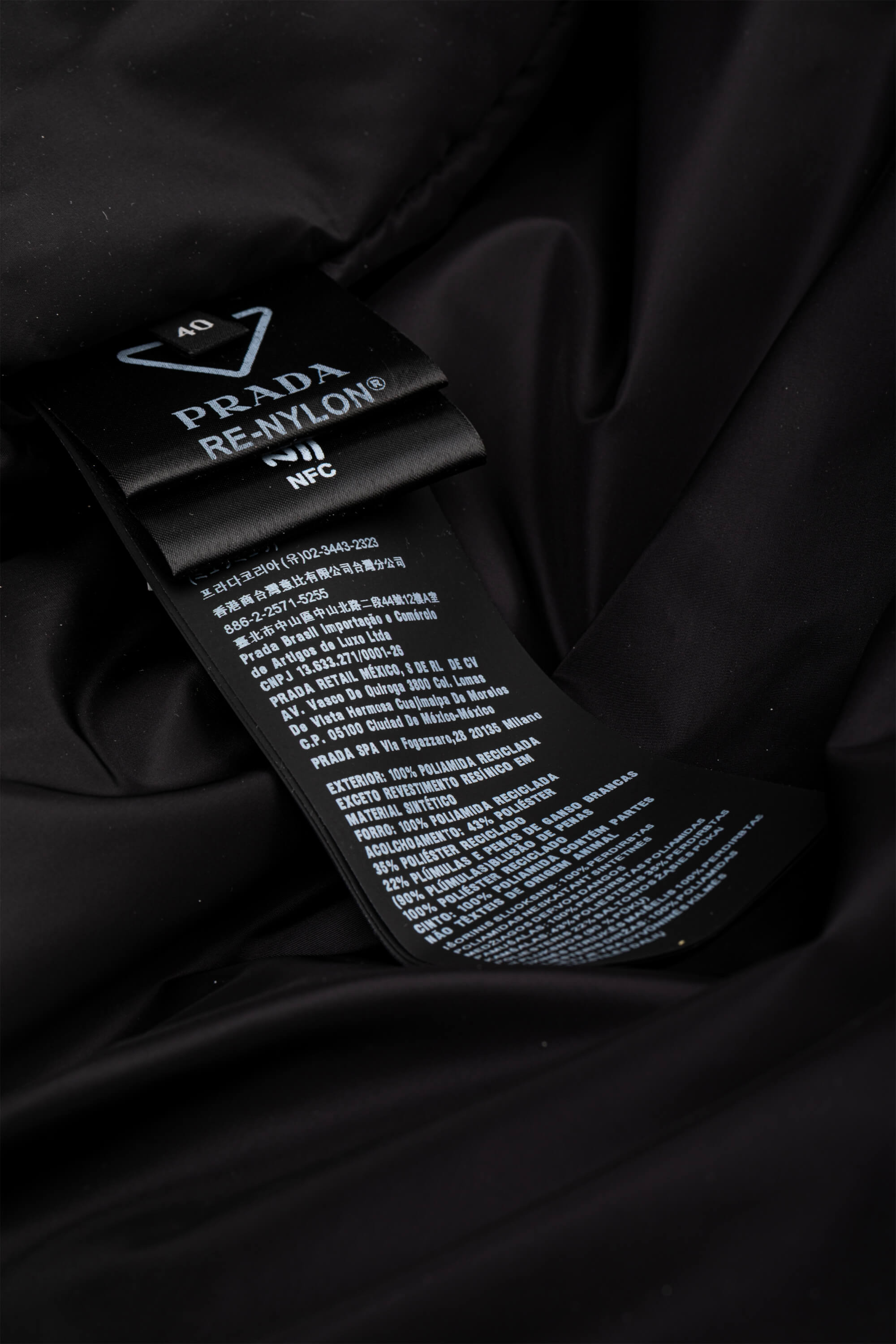 <span style="font-size: 10px;letter-spacing: .15em">BEST DEAL</span><br> <strong>PRADA</strong><br> <div style="margin-top:10px;font-size:16px">Re-Nylon Belted Down Jacket Black 40</div><br> - Image 16