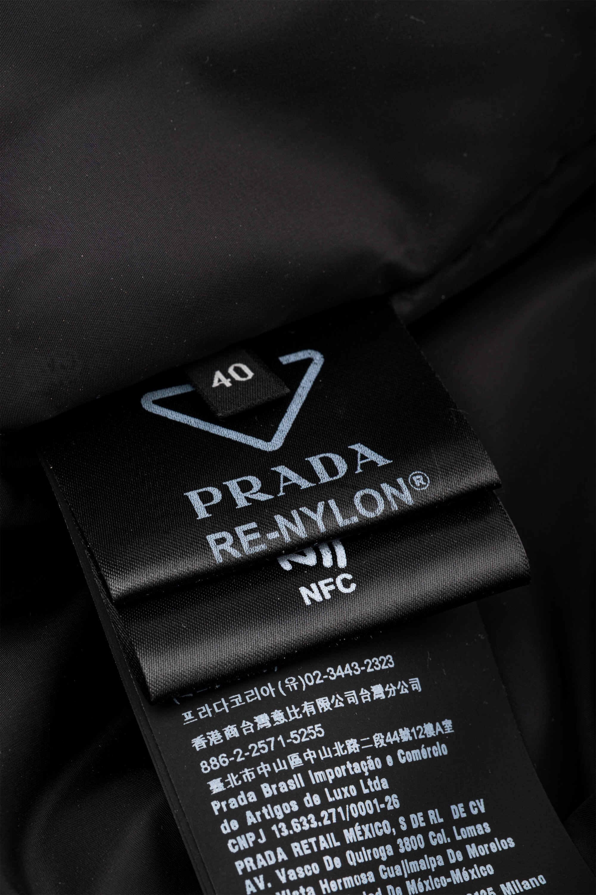 <span style="font-size: 10px;letter-spacing: .15em">BEST DEAL</span><br> <strong>PRADA</strong><br> <div style="margin-top:10px;font-size:16px">Re-Nylon Belted Down Jacket Black 40</div><br> - Image 15