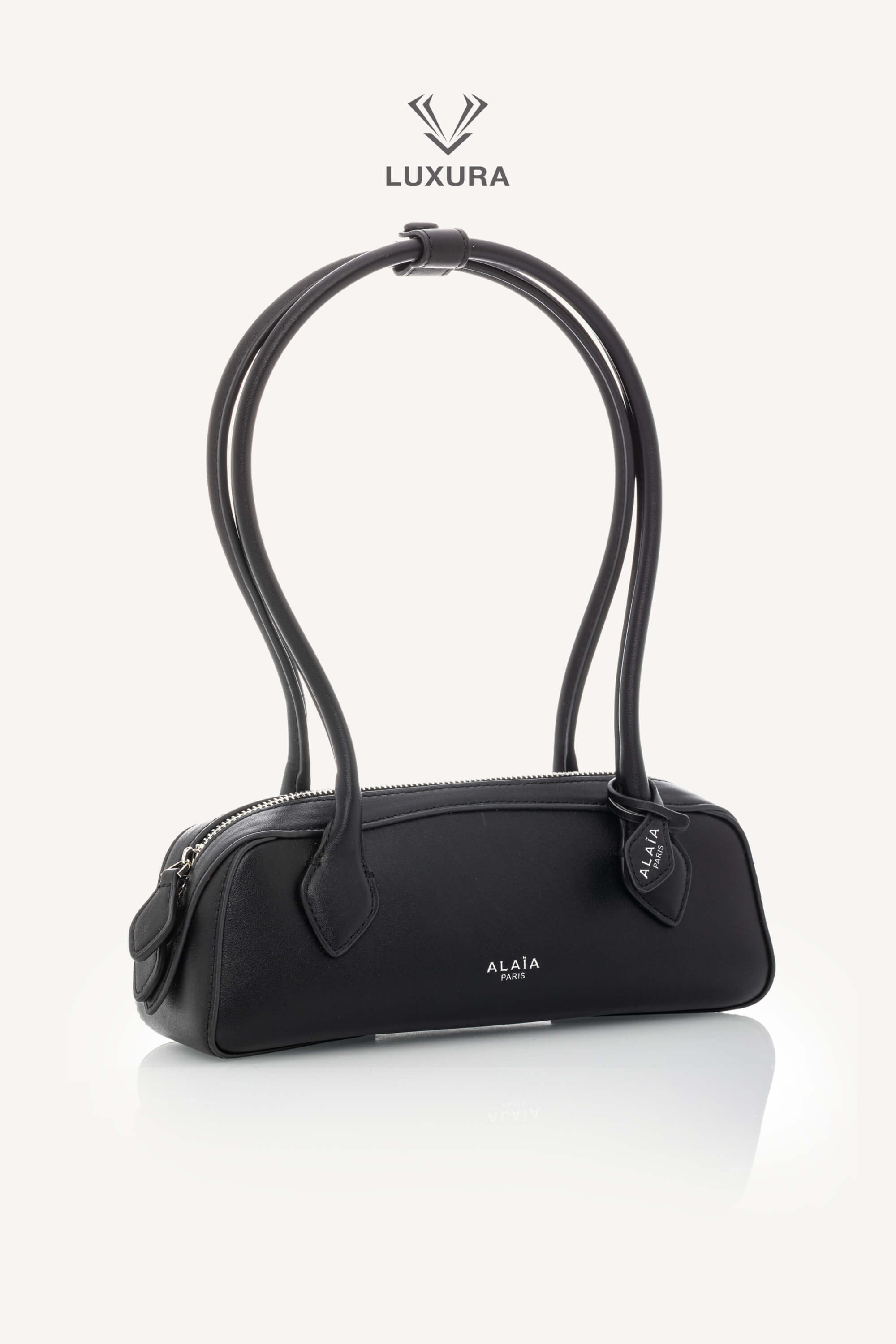 <span style="font-size: 10px;letter-spacing: .15em">HARD TO FIND</span><br> <strong>ALAIA</strong><br> <div style="margin-top:10px;font-size:16px">Goatskin Medium Le Teckel Bag Black</div><br> - Image 2
