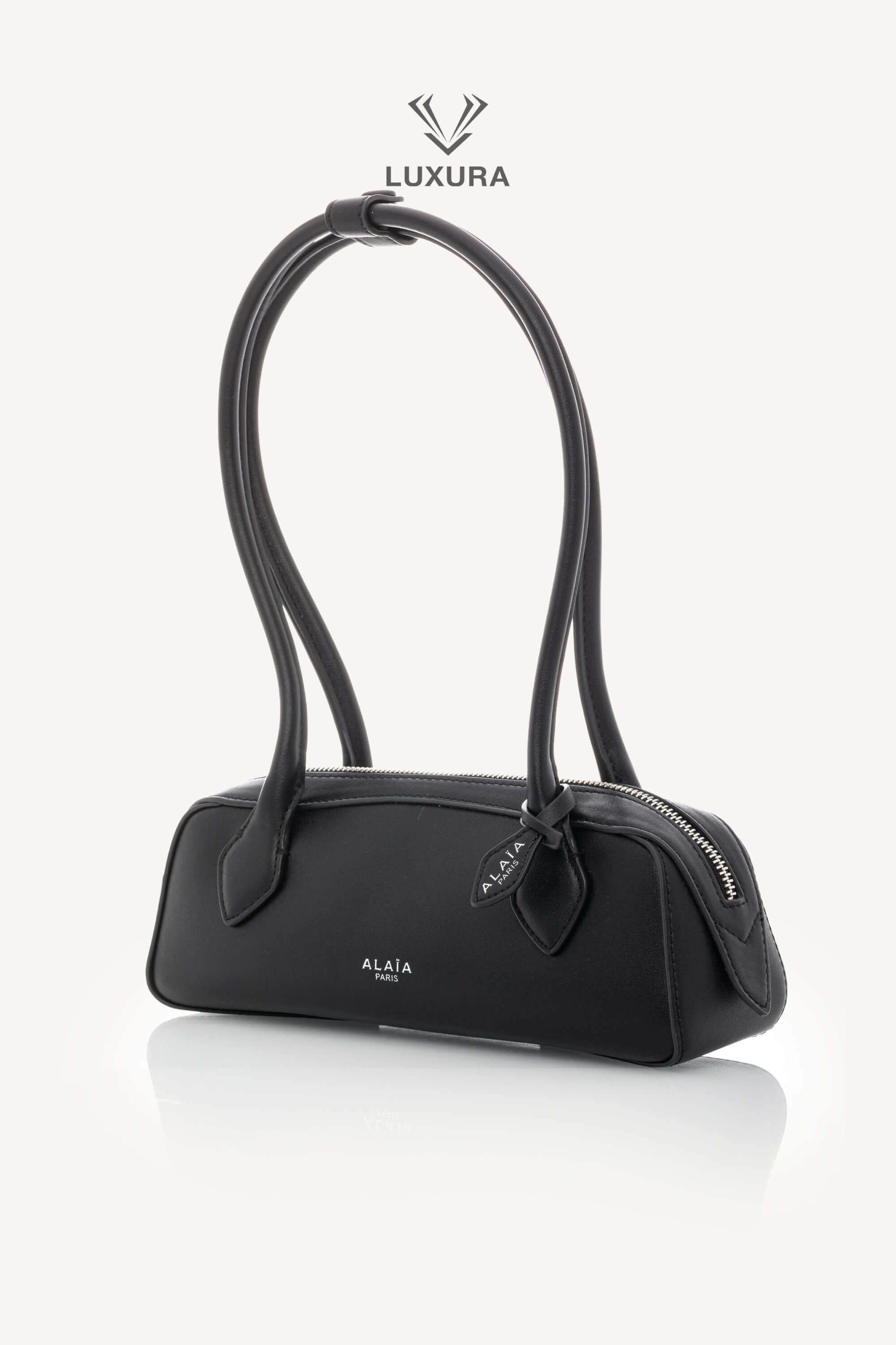 <span style="font-size: 10px;letter-spacing: .15em">HARD TO FIND</span><br> <strong>ALAIA</strong><br> <div style="margin-top:10px;font-size:16px">Goatskin Medium Le Teckel Bag Black</div><br> - Image 6