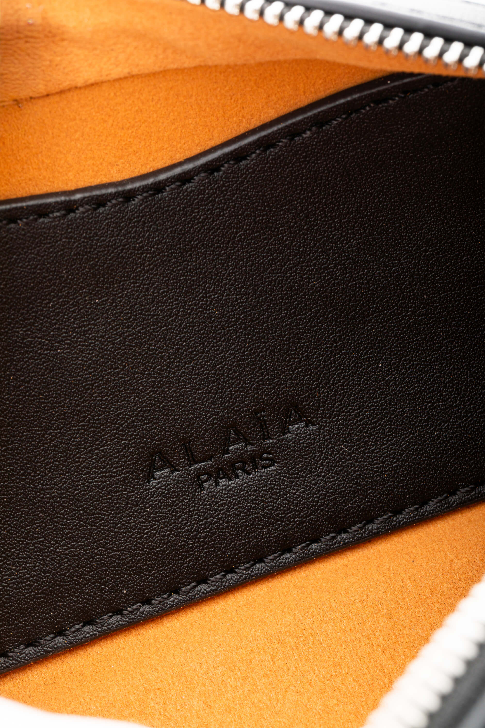 <span style="font-size: 10px;letter-spacing: .15em">HARD TO FIND</span><br> <strong>ALAIA</strong><br> <div style="margin-top:10px;font-size:16px">Goatskin Medium Le Teckel Bag Black</div><br> - Image 11