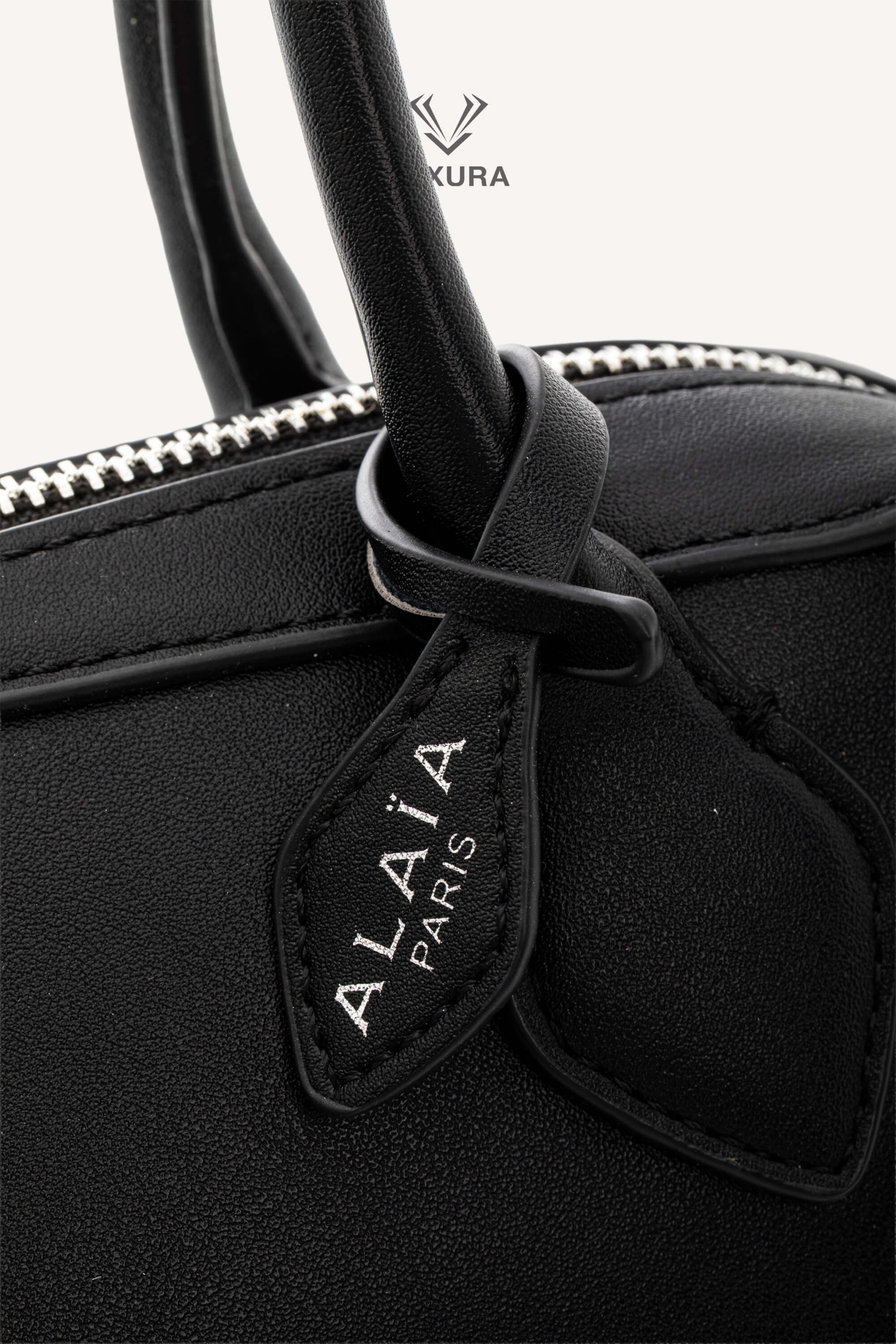 <span style="font-size: 10px;letter-spacing: .15em">HARD TO FIND</span><br> <strong>ALAIA</strong><br> <div style="margin-top:10px;font-size:16px">Goatskin Medium Le Teckel Bag Black</div><br> - Image 7